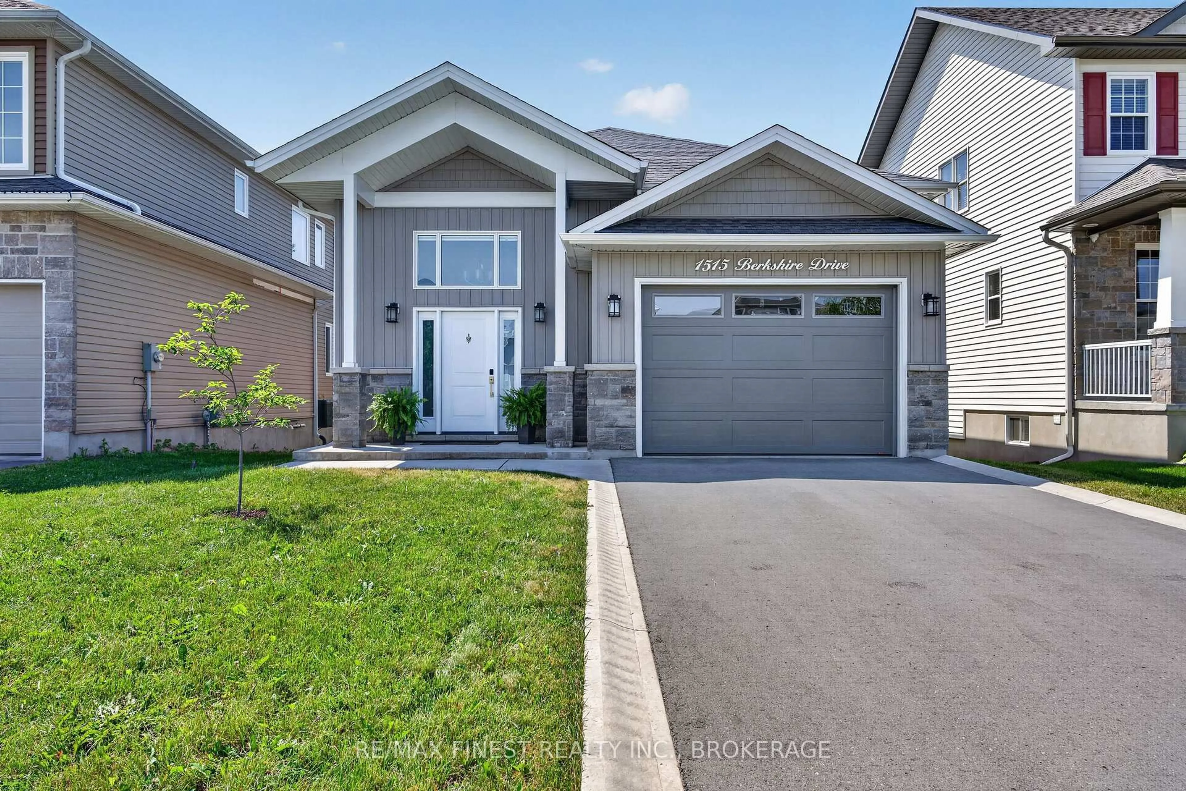 Home with vinyl exterior material, street for 1515 Berkshire Dr, Kingston Ontario K7P 0S7