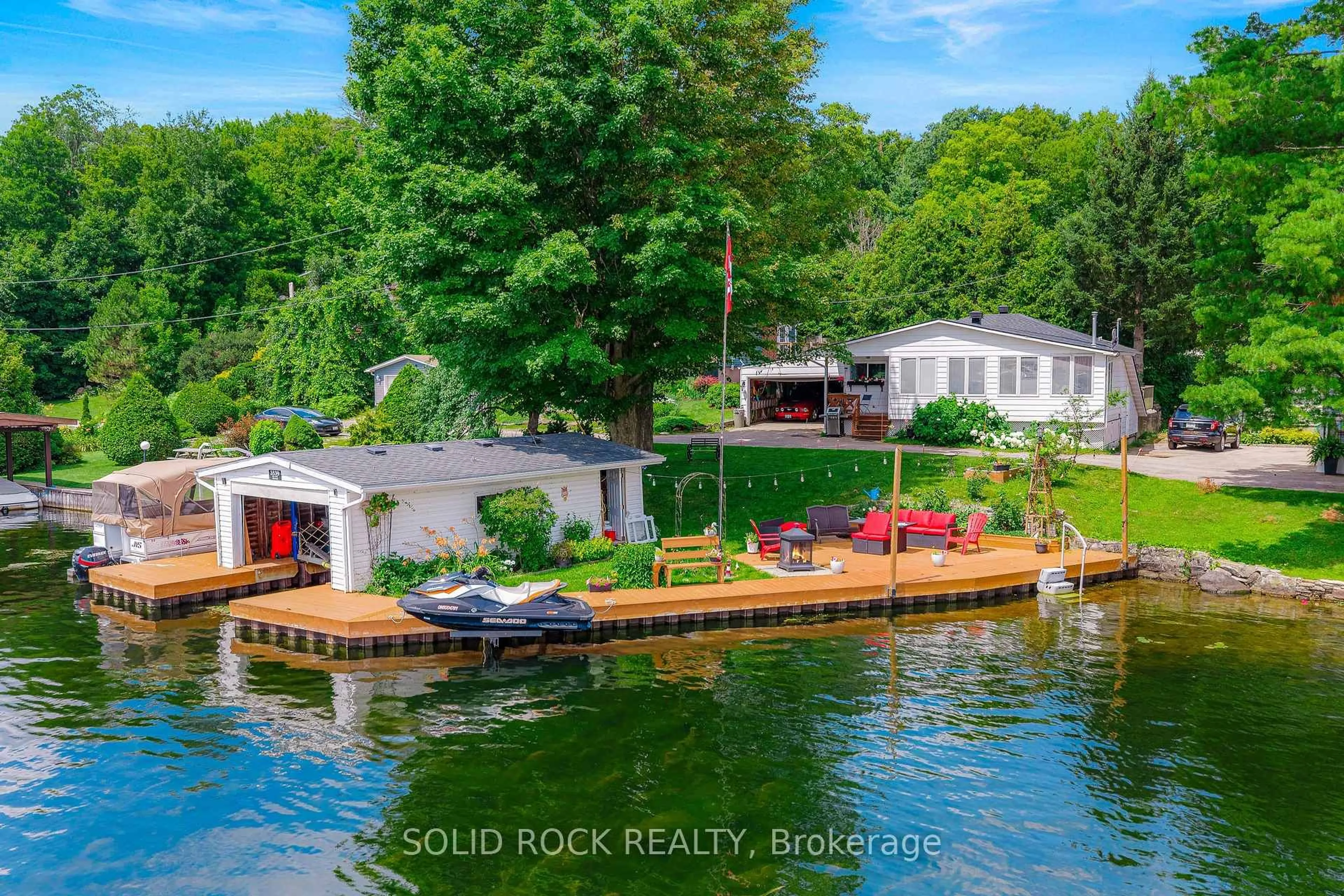 A pic from outside/outdoor area/front of a property/back of a property/a pic from drone, water/lake/river/ocean view for 3539 R35 Rte, Rideau Lakes Ontario K0G 1V0