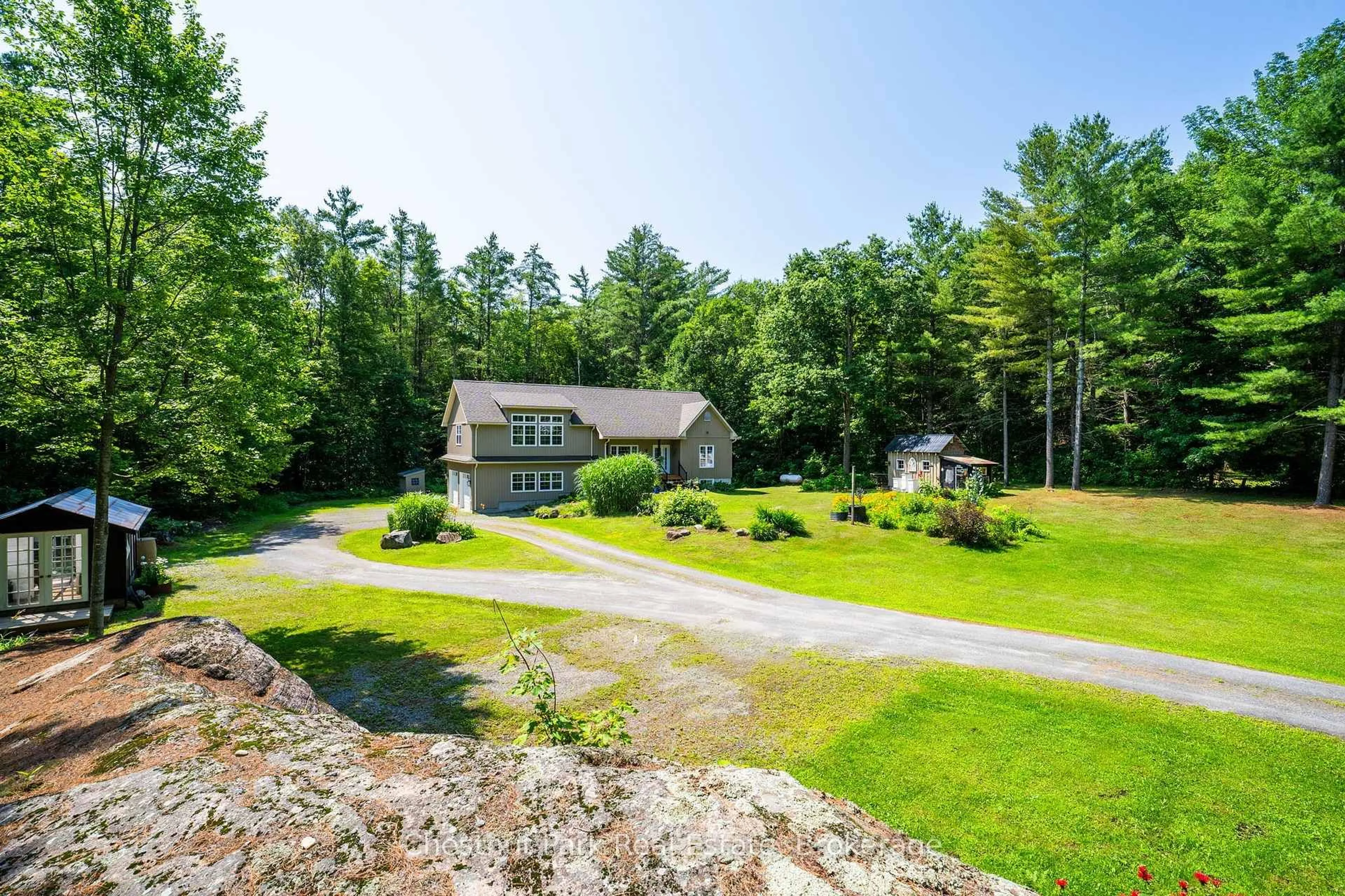 A pic from outside/outdoor area/front of a property/back of a property/a pic from drone, unknown for 1130 Taylor Rd, Bracebridge Ontario P1L 0A1