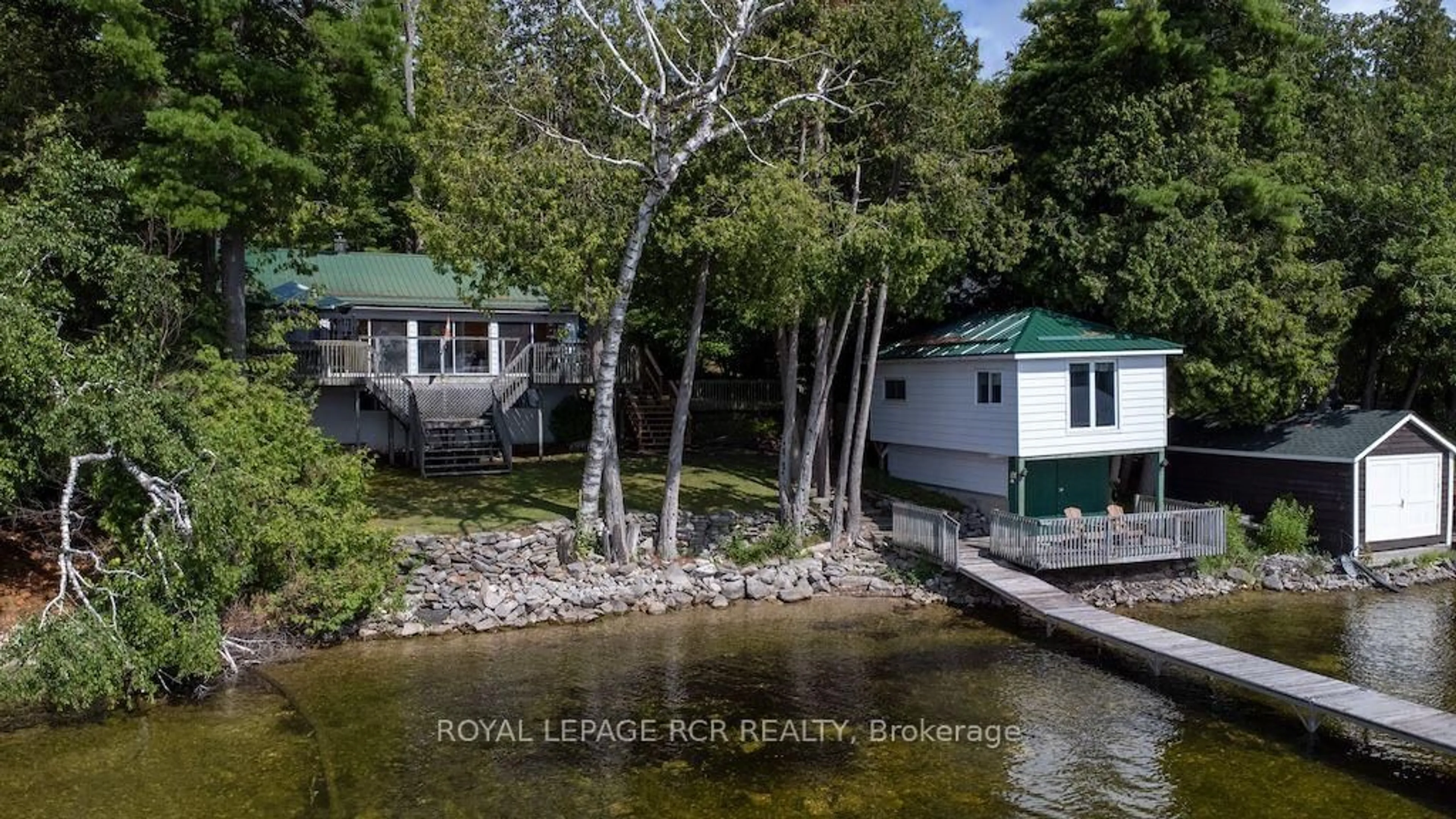 A pic from outside/outdoor area/front of a property/back of a property/a pic from drone, water/lake/river/ocean view for 40 Griffin Dr, Kawartha Lakes Ontario K0M 1K0