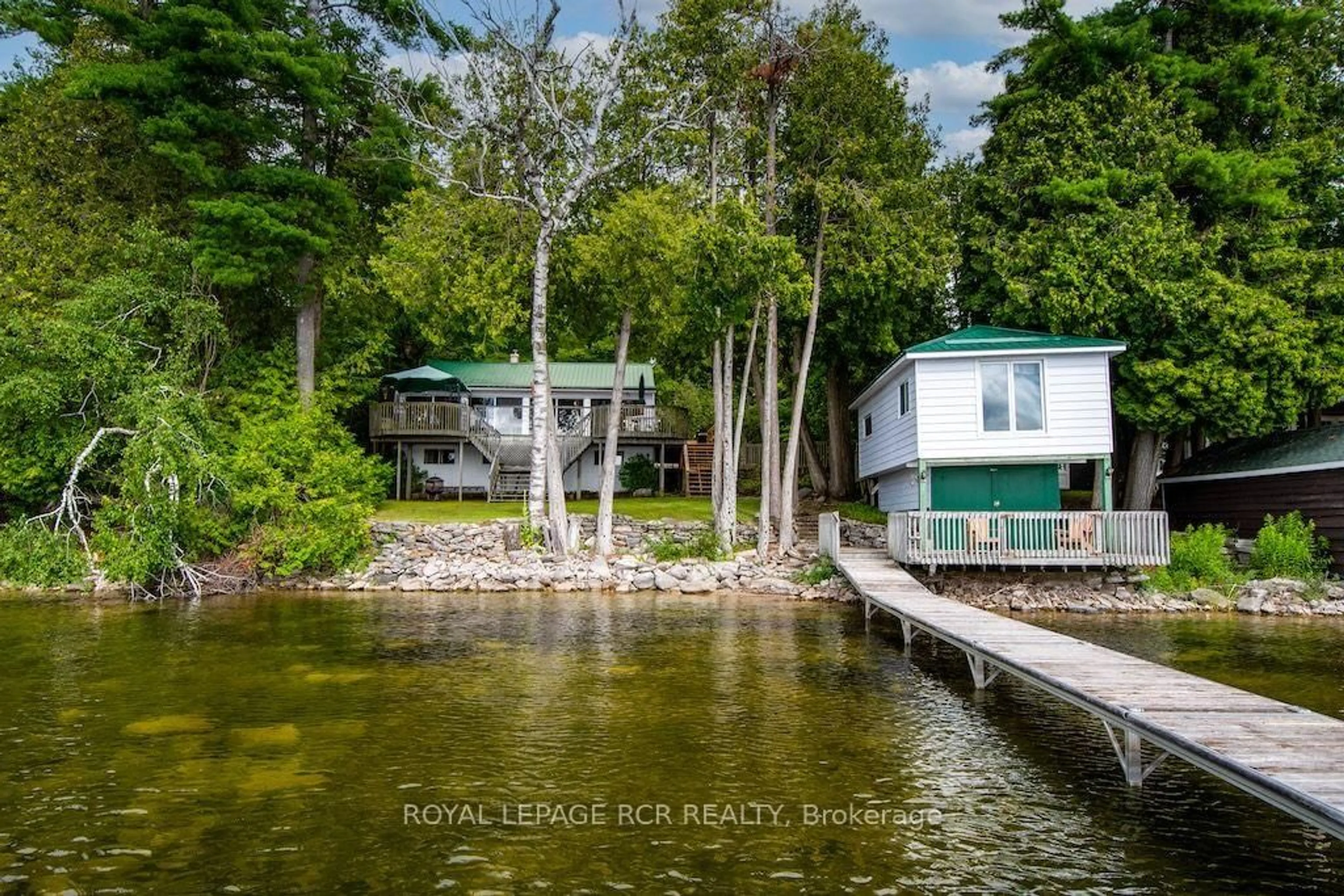 A pic from outside/outdoor area/front of a property/back of a property/a pic from drone, water/lake/river/ocean view for 40 Griffin Dr, Kawartha Lakes Ontario K0M 1K0