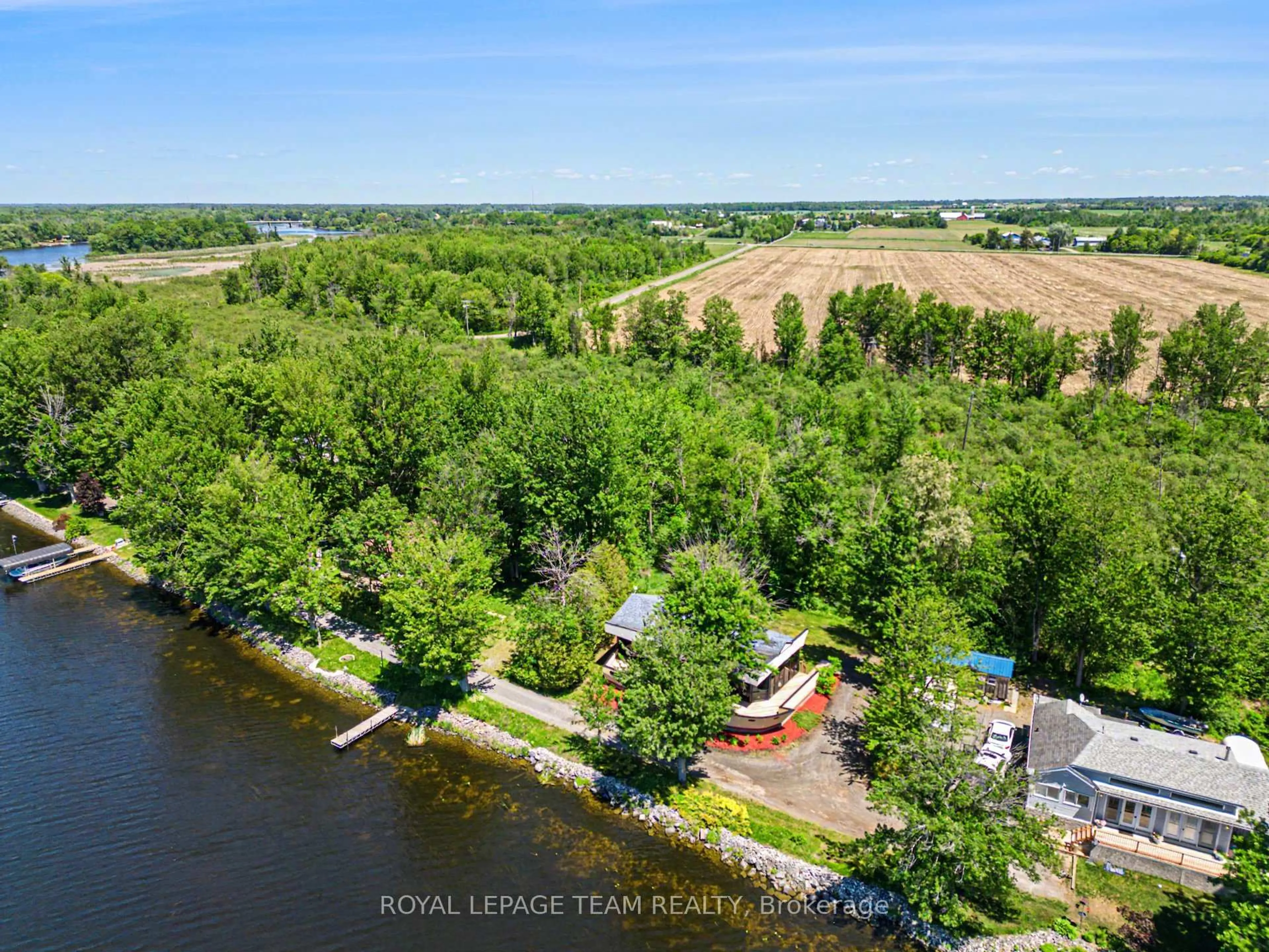A pic from outside/outdoor area/front of a property/back of a property/a pic from drone, water/lake/river/ocean view for 5066K Lorne Bridge Rd, Ottawa Ontario K4M 1B4