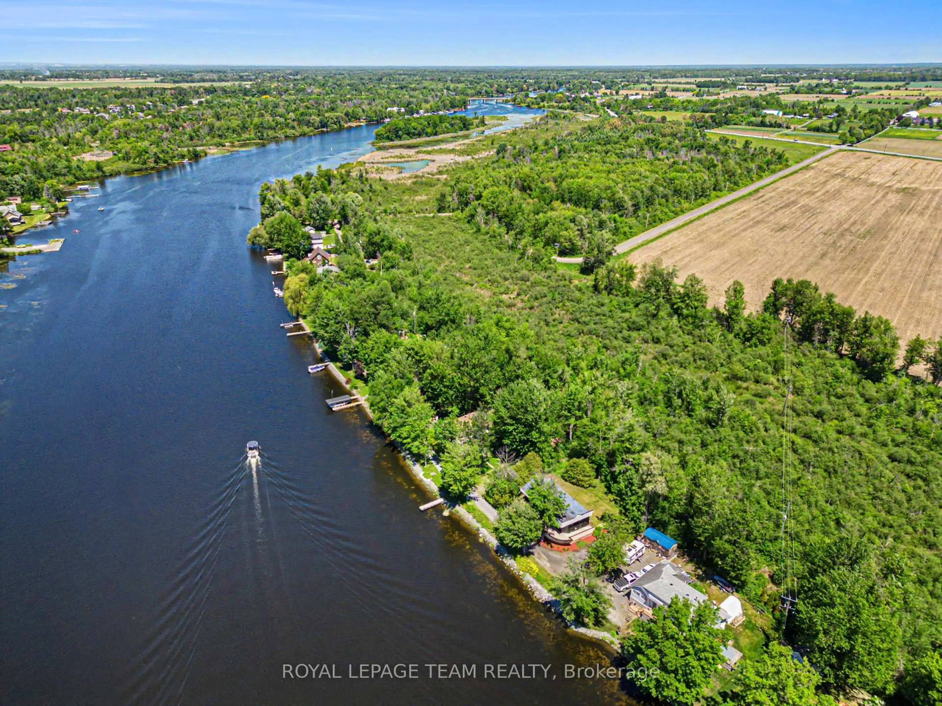 A pic from outside/outdoor area/front of a property/back of a property/a pic from drone, water/lake/river/ocean view for 5066K Lorne Bridge Rd, Ottawa Ontario K4M 1B4