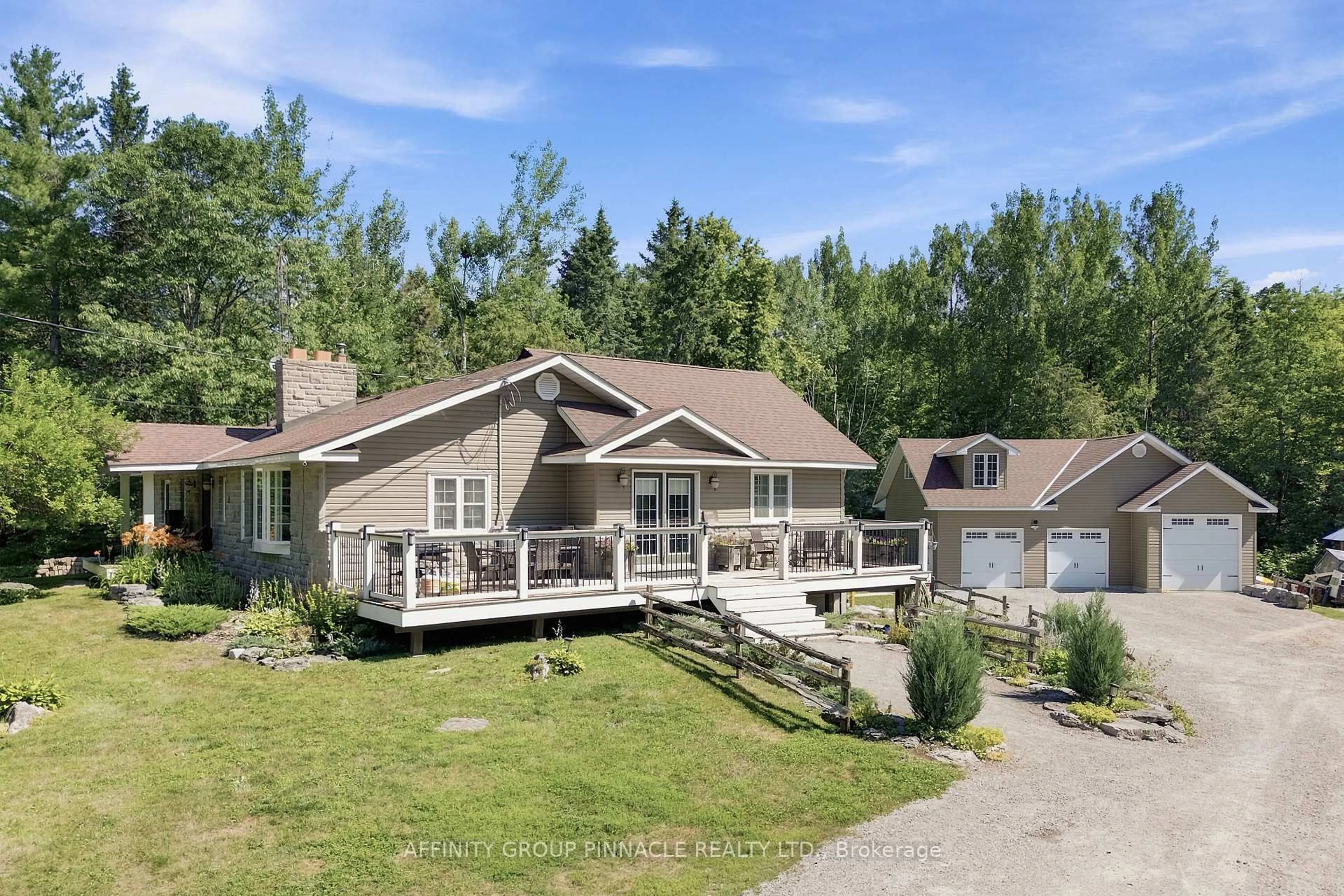 A pic from outside/outdoor area/front of a property/back of a property/a pic from drone, water/lake/river/ocean view for 1930 County Rd 121 Rd, Kawartha Lakes Ontario K0M 1N0