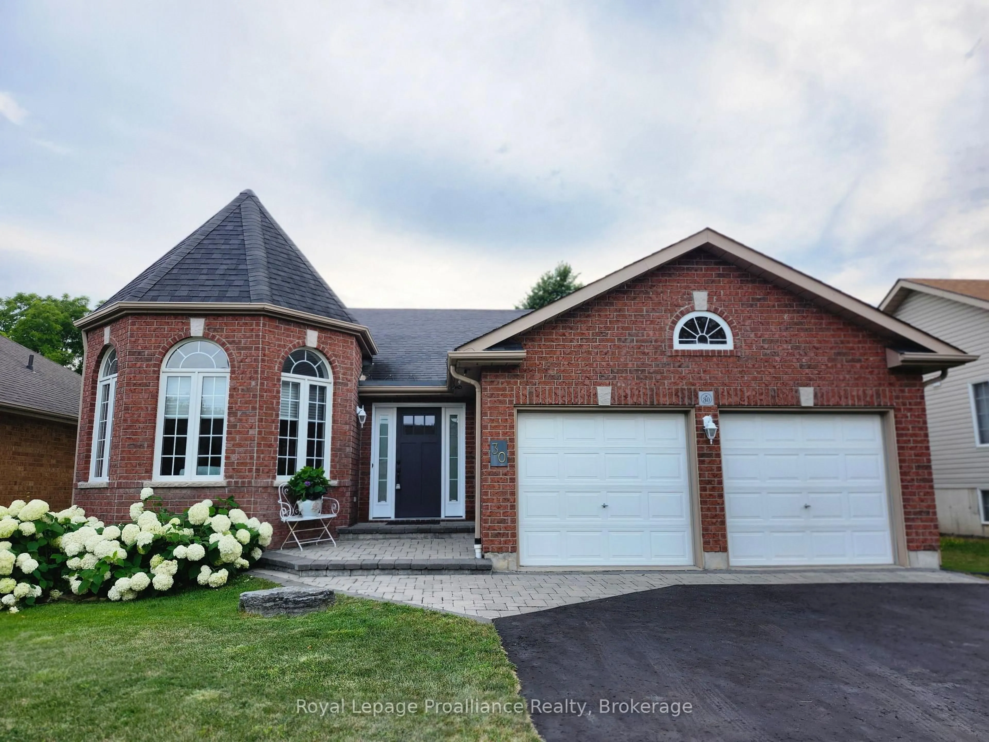 Home with brick exterior material, street for 30 Heartwood Dr, Belleville Ontario K8P 5L9