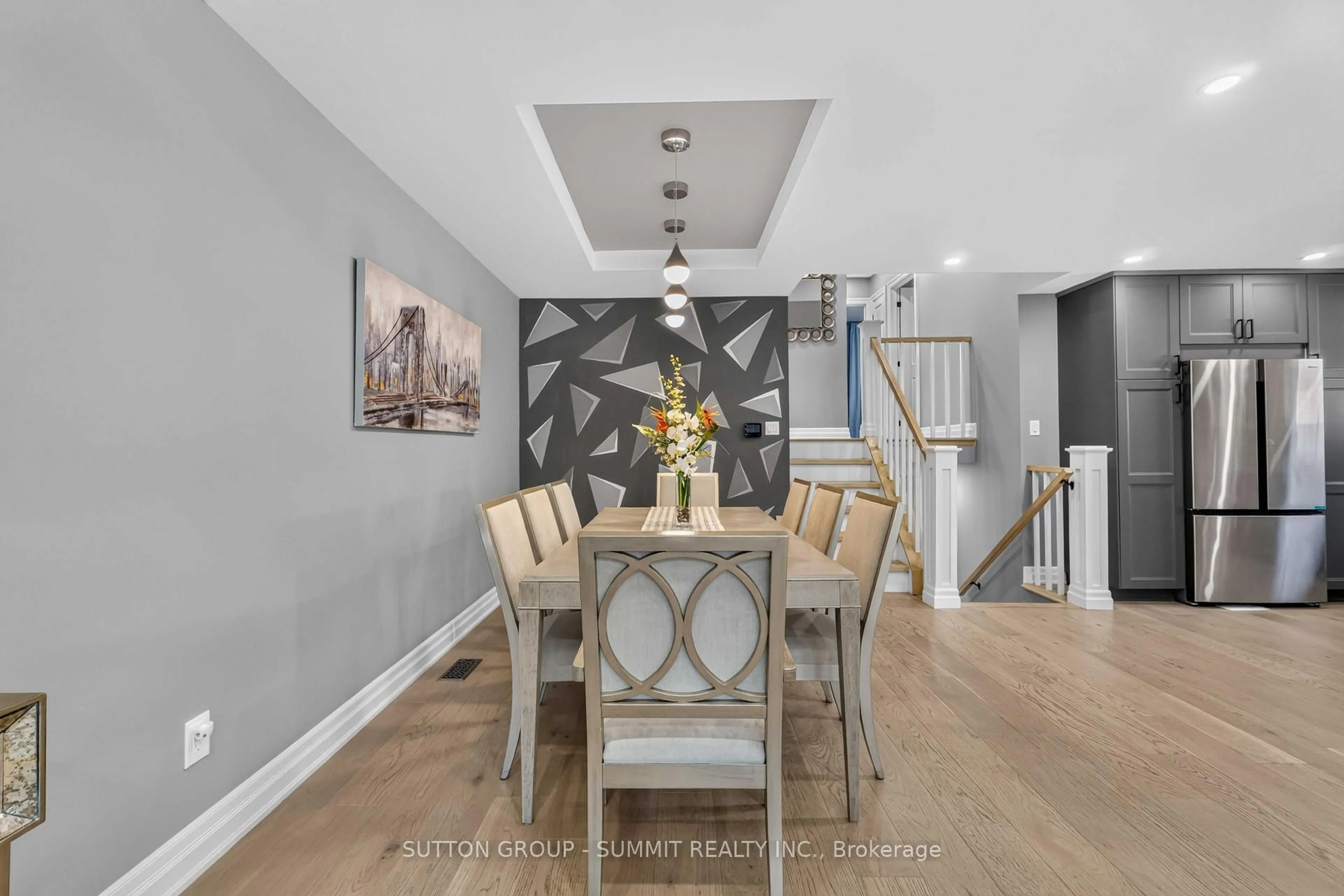 Dining room, wood/laminate floor for 53 Greening Ave, Hamilton Ontario L8E 3Z8