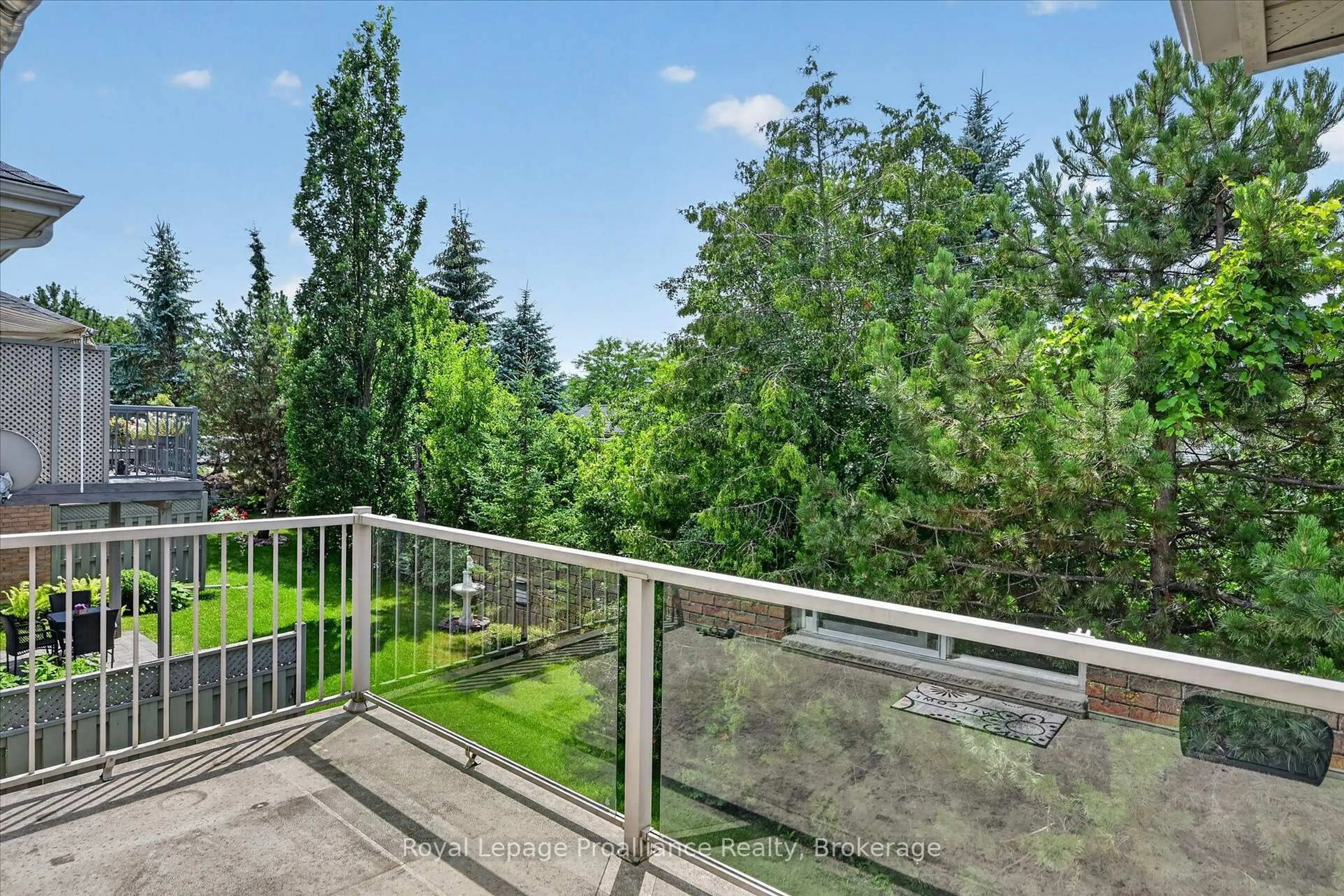 Patio, forest/trees view for 1742 Ravenwood Dr #507, Peterborough Ontario K9K 2R6
