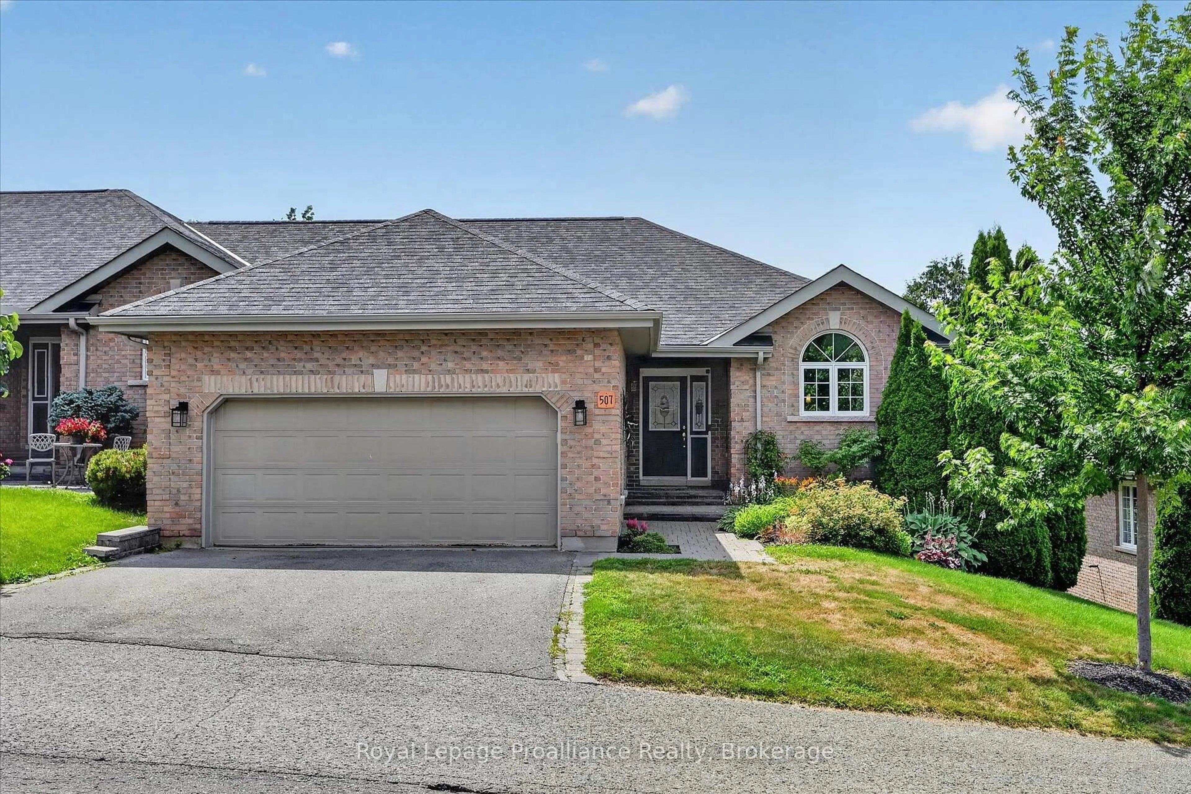 Home with brick exterior material, street for 1742 Ravenwood Dr #507, Peterborough Ontario K9K 2R6