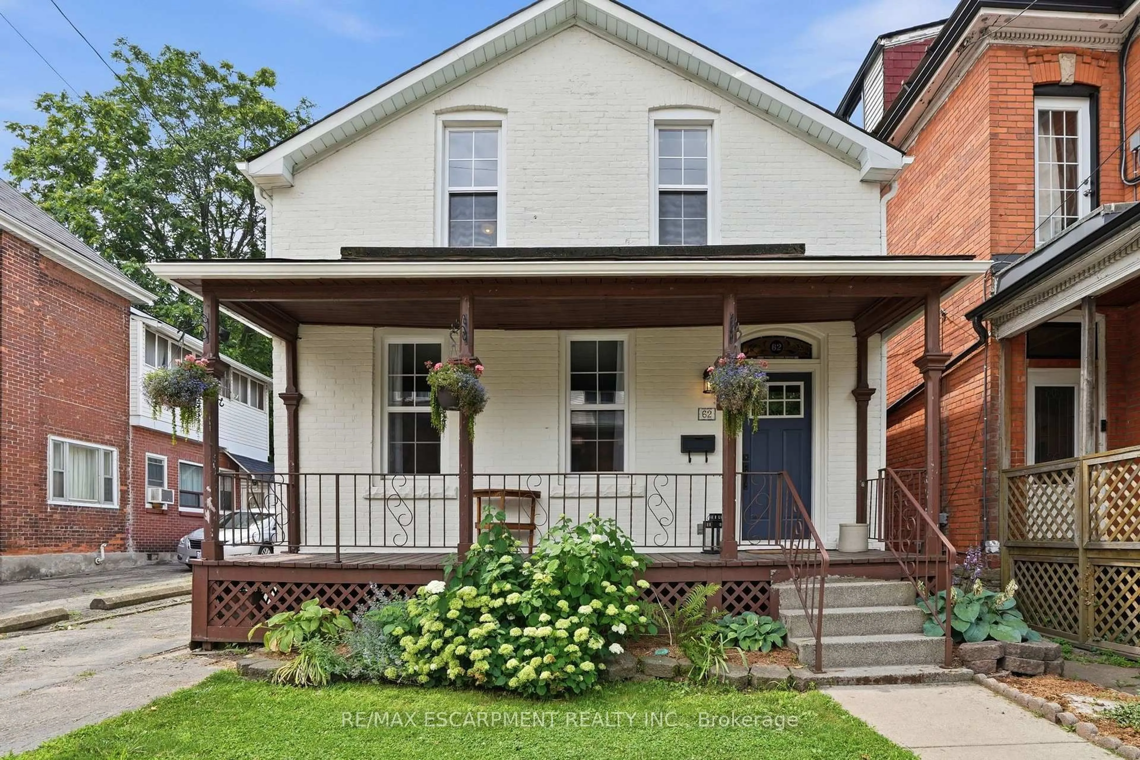 Home with brick exterior material, street for 62 Alanson St, Hamilton Ontario L8N 1W5