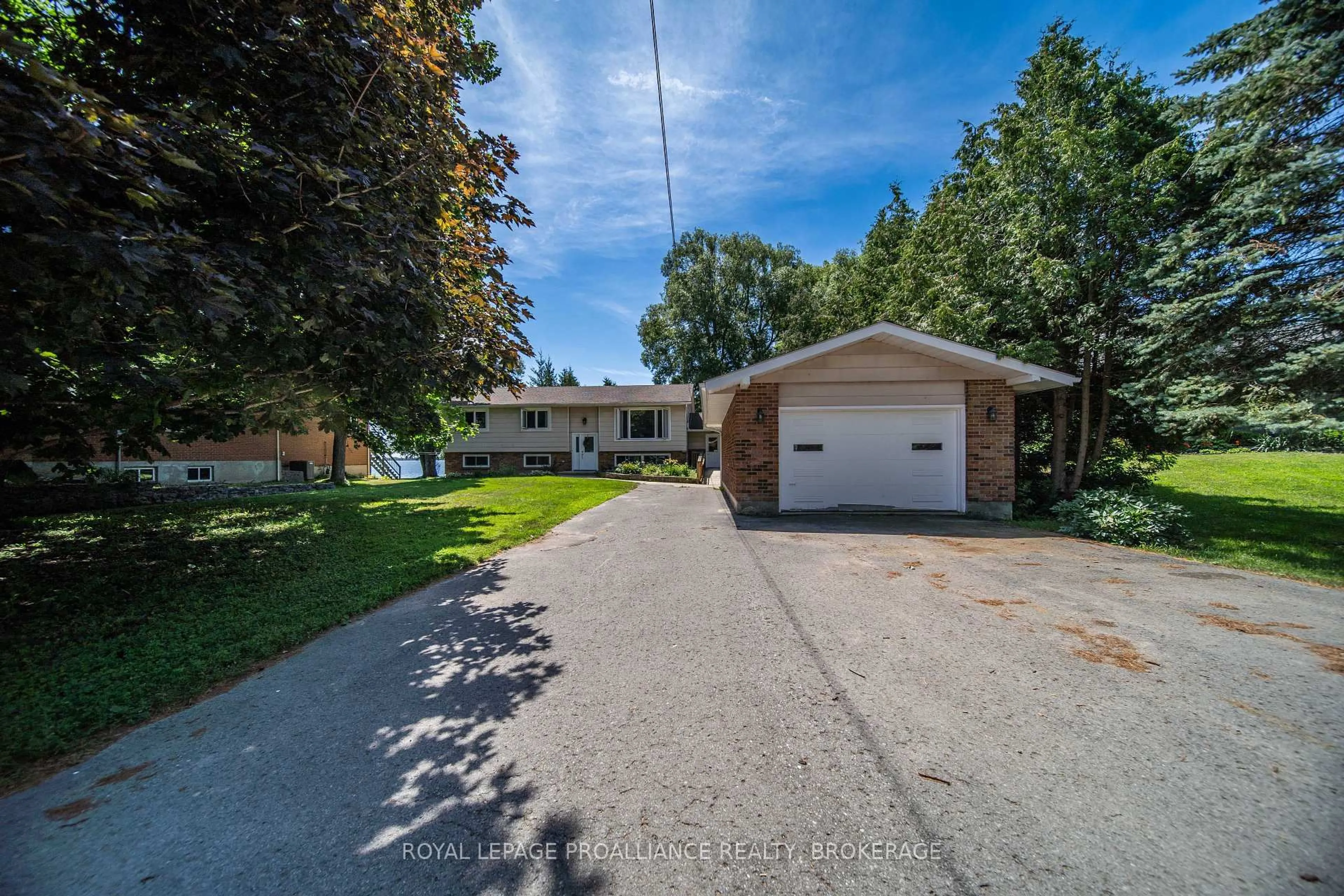 A pic from outside/outdoor area/front of a property/back of a property/a pic from drone, street for 94 Nicholson Point Rd, Bath Ontario K0H 1G0