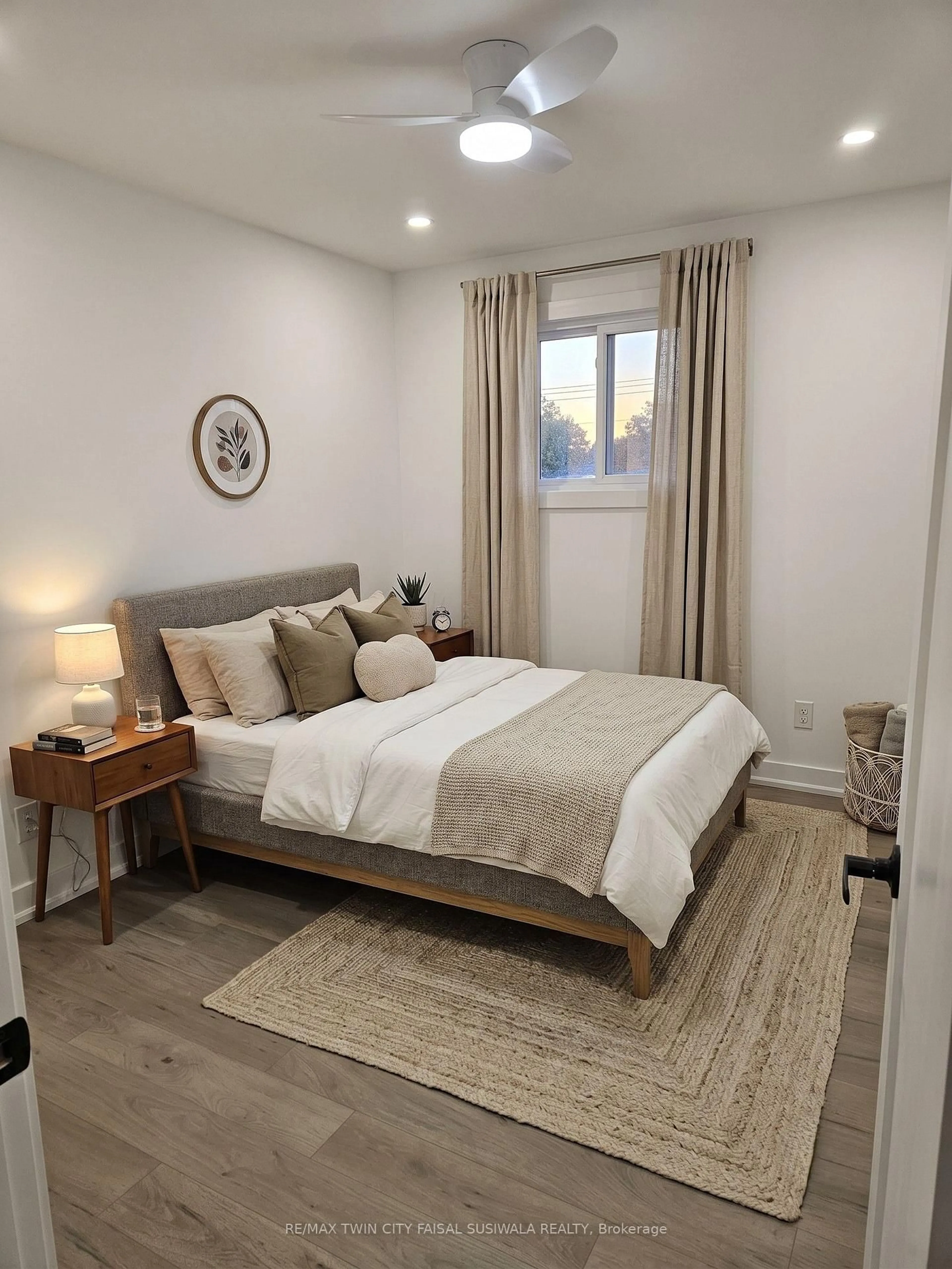Bedroom with bed, wood/laminate floor for 87 Scott Rd, Cambridge Ontario N3C 2X6