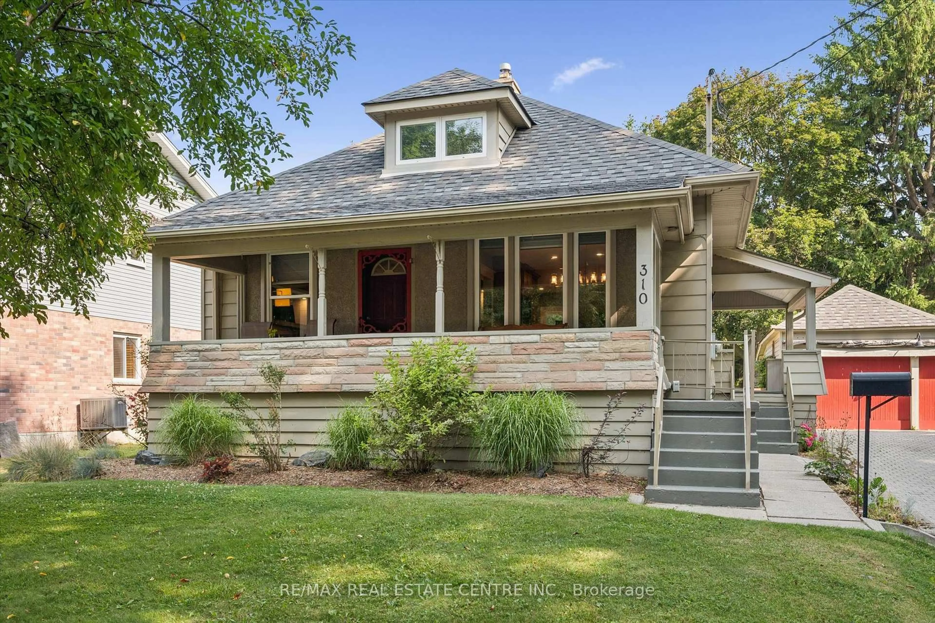Home with brick exterior material, street for 310 Kitchener Rd, Cambridge Ontario N3H 1A6