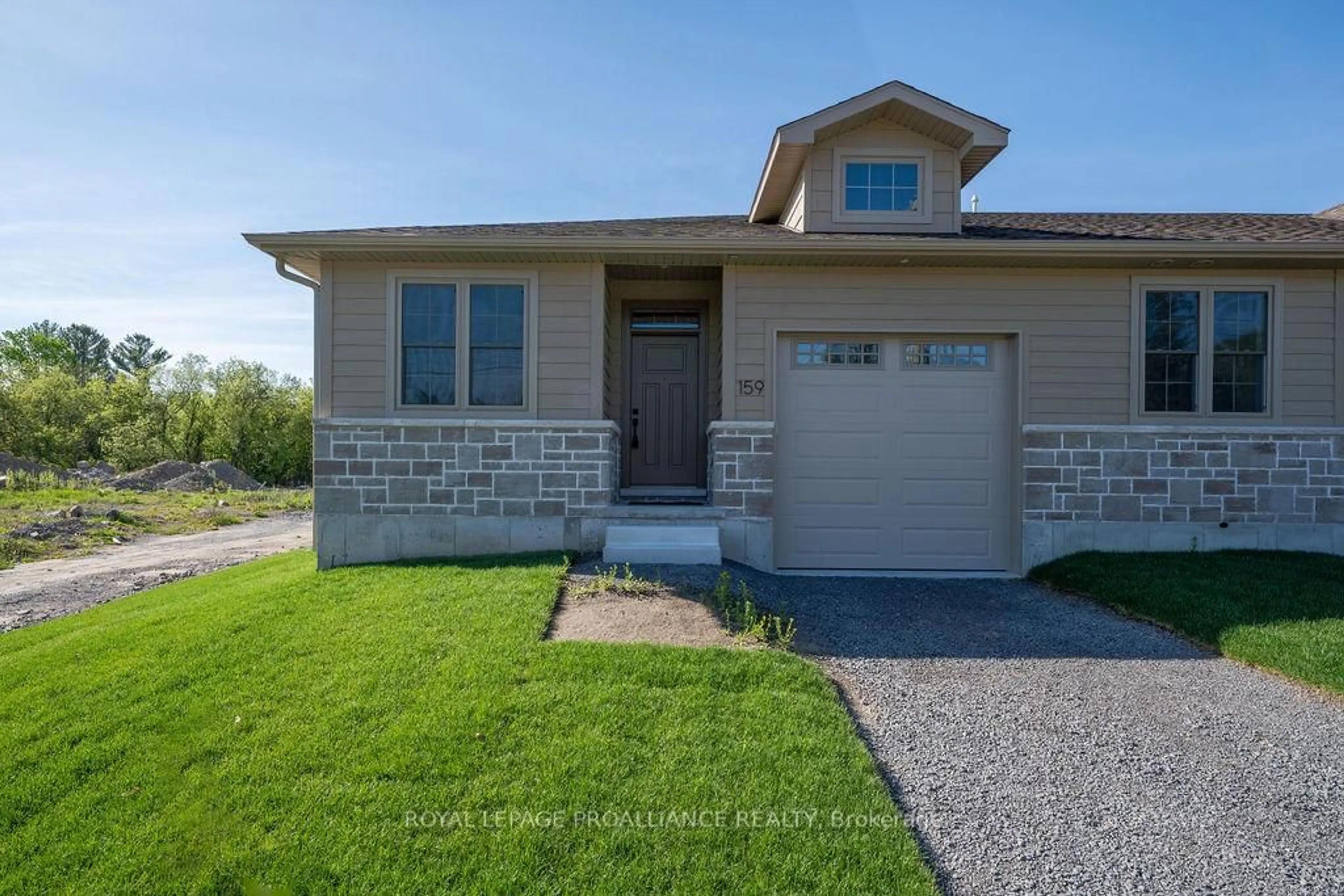 Home with vinyl exterior material, street for 159 Pomeroy Ave, Tweed Ontario K0K 3J0