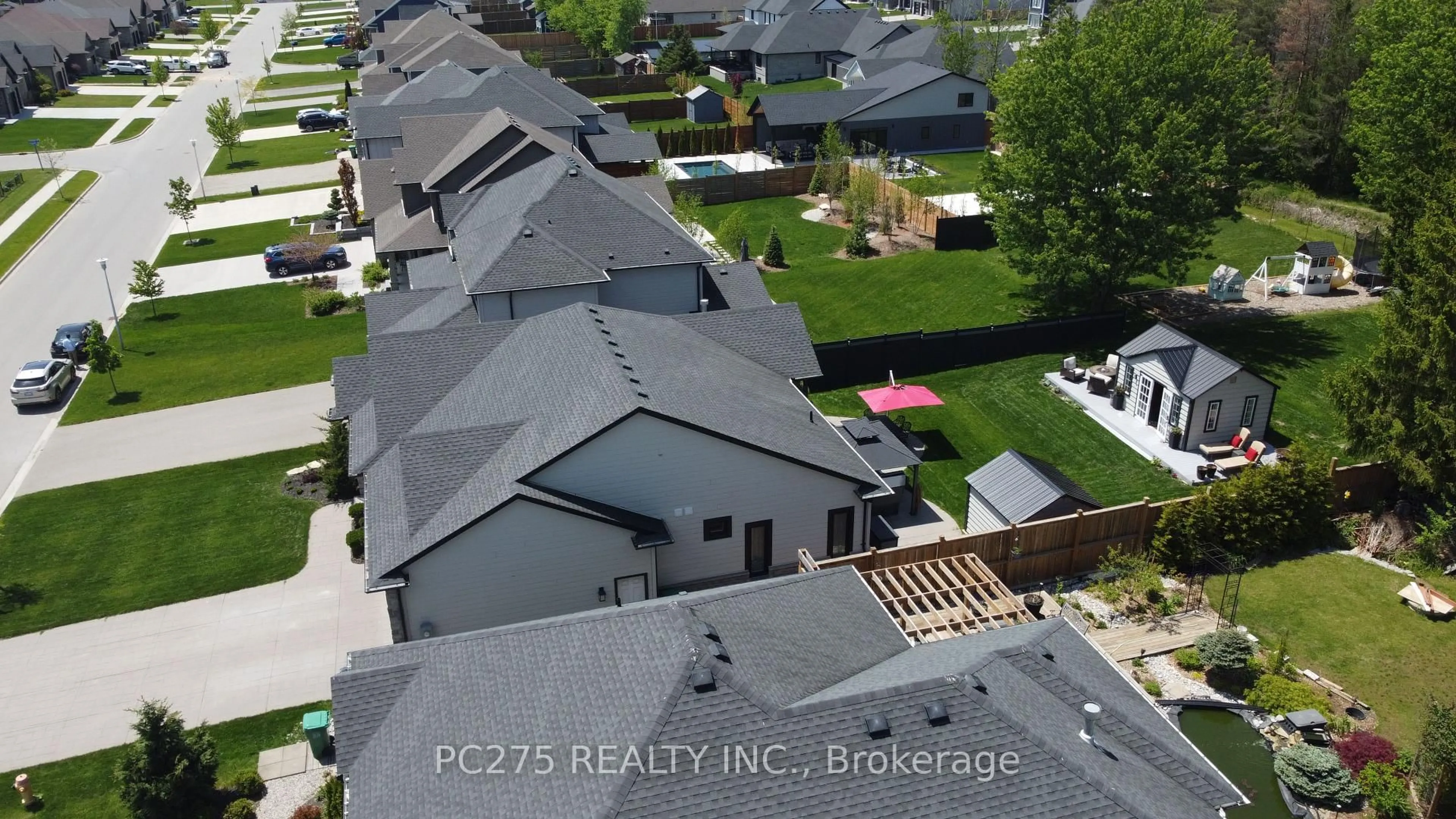 A pic from outside/outdoor area/front of a property/back of a property/a pic from drone, unknown for 22 Talbot Grove Lane, Southwold Ontario N5P 3T2