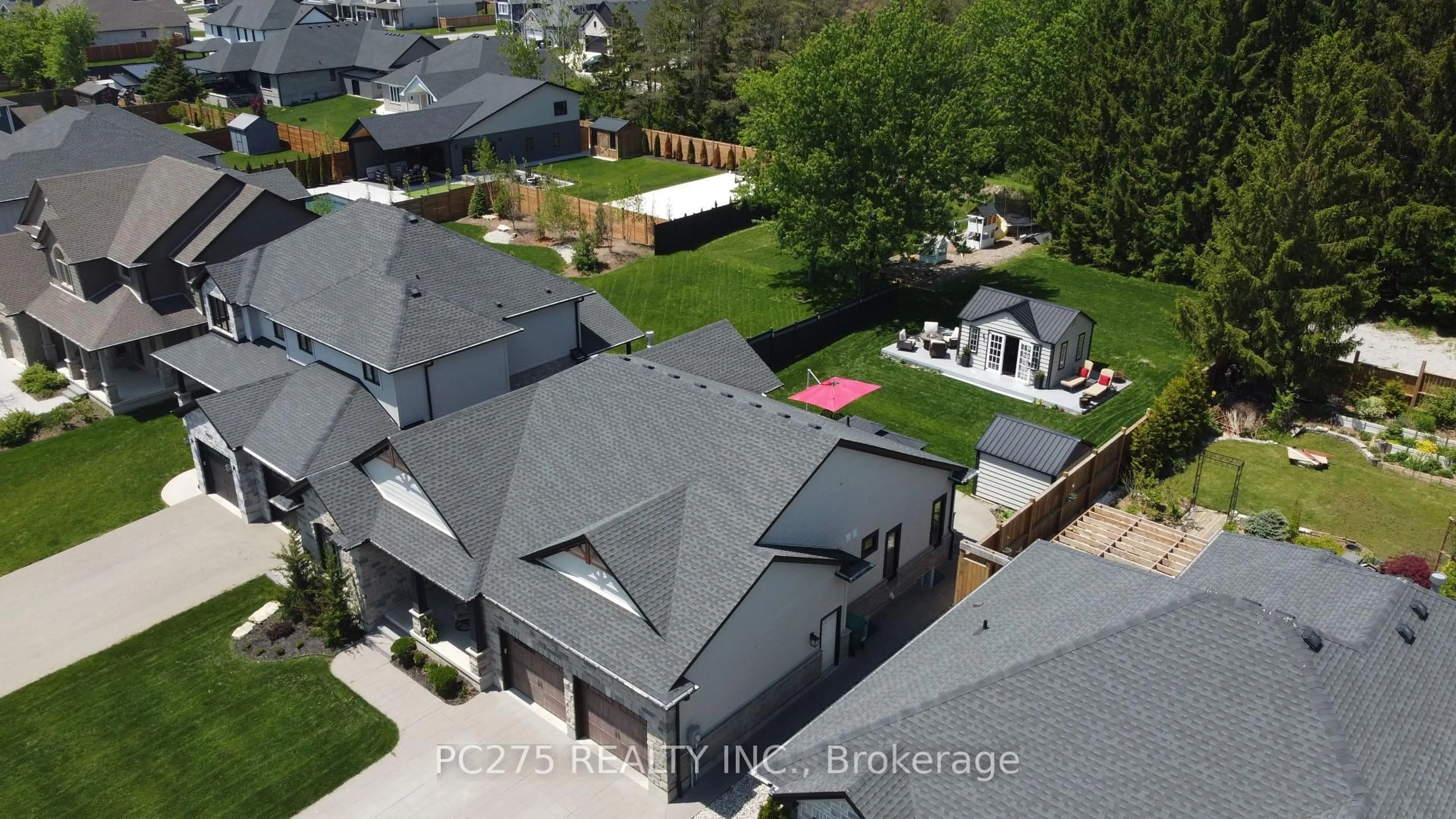 A pic from outside/outdoor area/front of a property/back of a property/a pic from drone, unknown for 22 Talbot Grove Lane, Southwold Ontario N5P 3T2