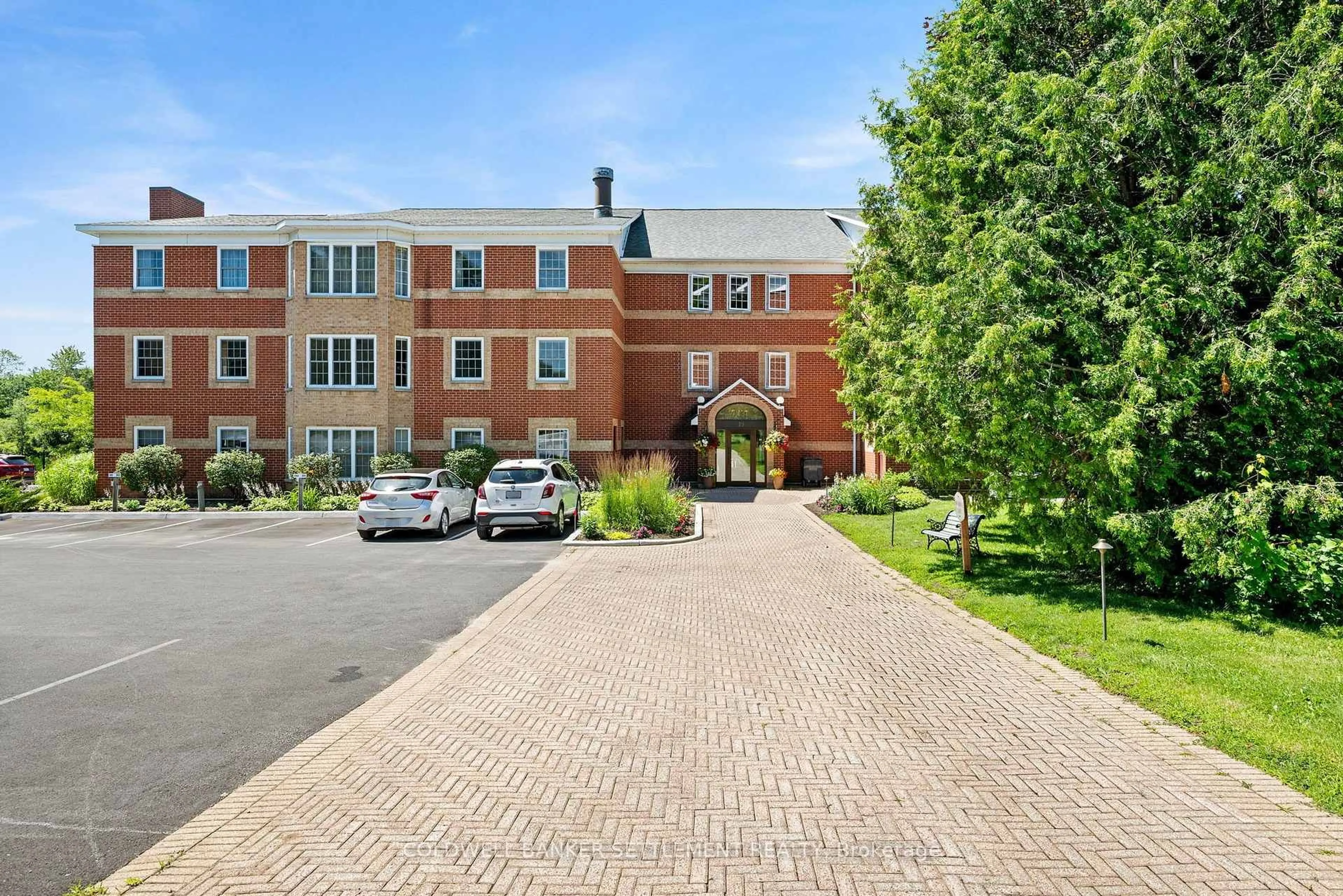 A pic from outside/outdoor area/front of a property/back of a property/a pic from drone, street for 19 John St #303, Perth Ontario K7H 1T8