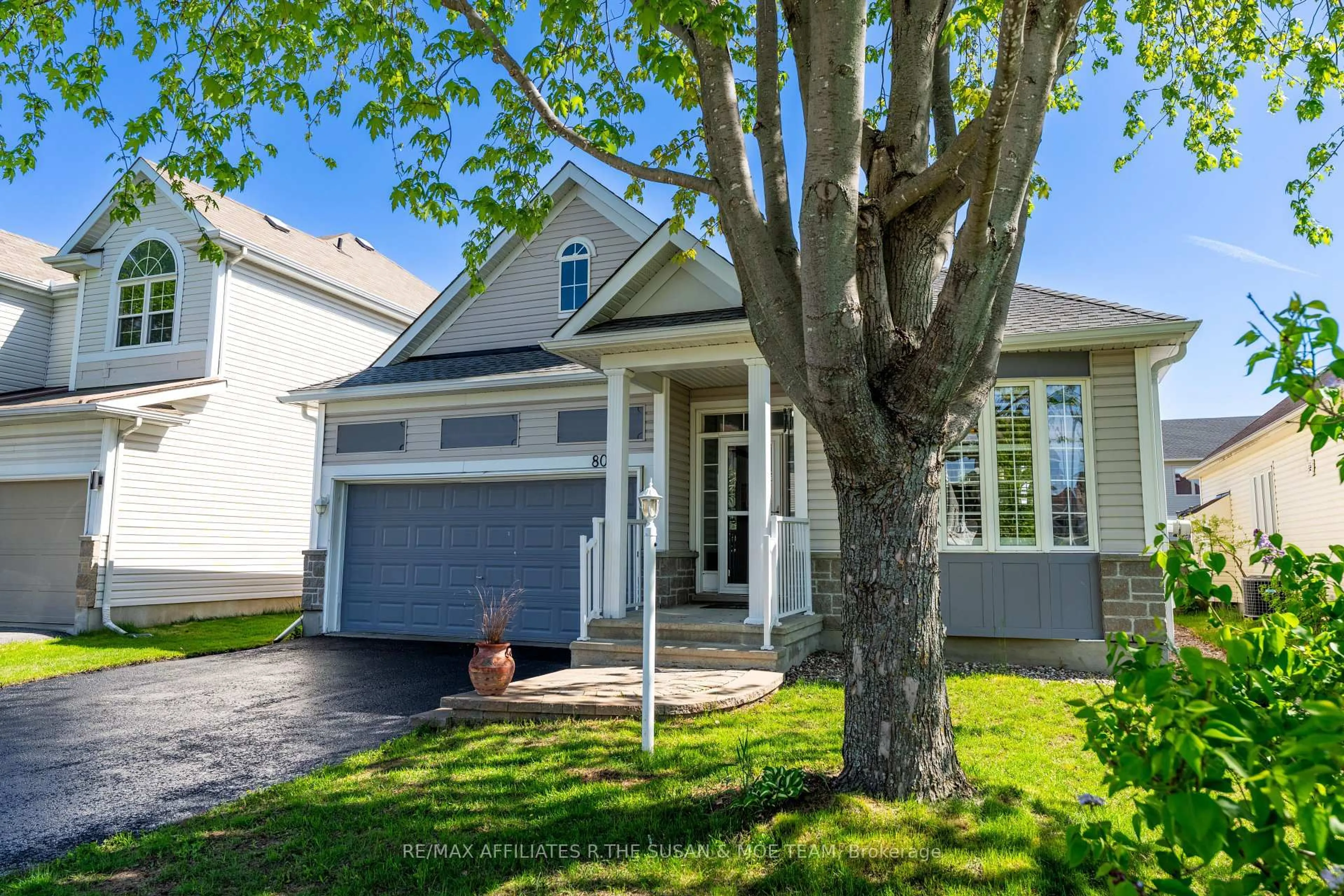 Home with vinyl exterior material, street for 80 Black Bear Way, Stittsville Ontario K2S 2G6