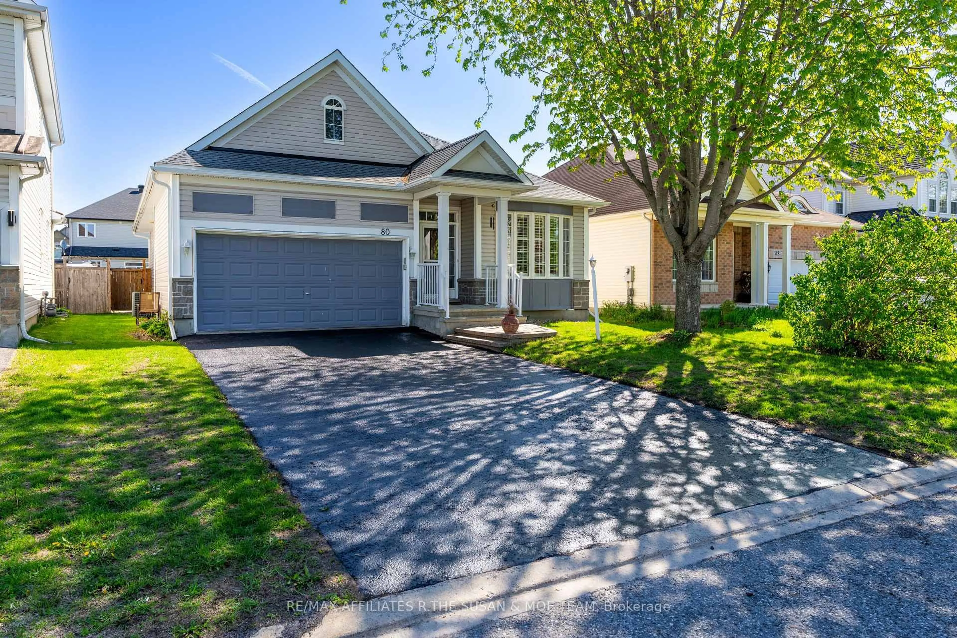 Home with brick exterior material, street for 80 Black Bear Way, Stittsville Ontario K2S 2G6