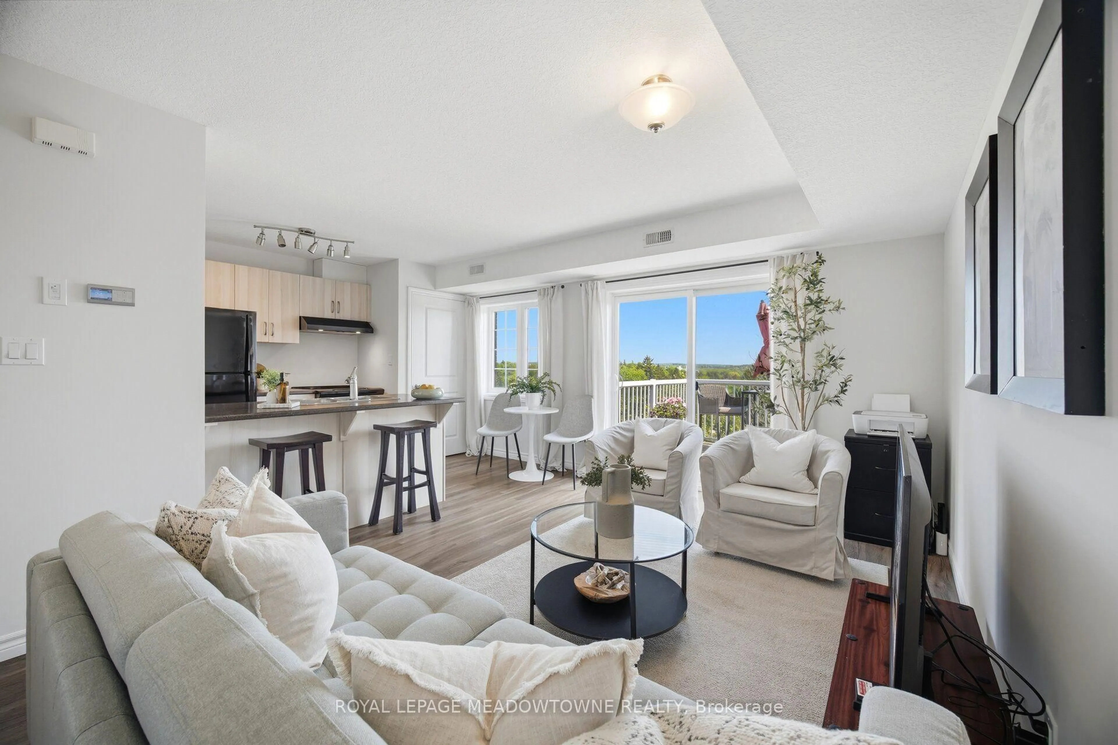 Living room with furniture, unknown for 7 Cityview Dr #207, Guelph Ontario N1E 0R1