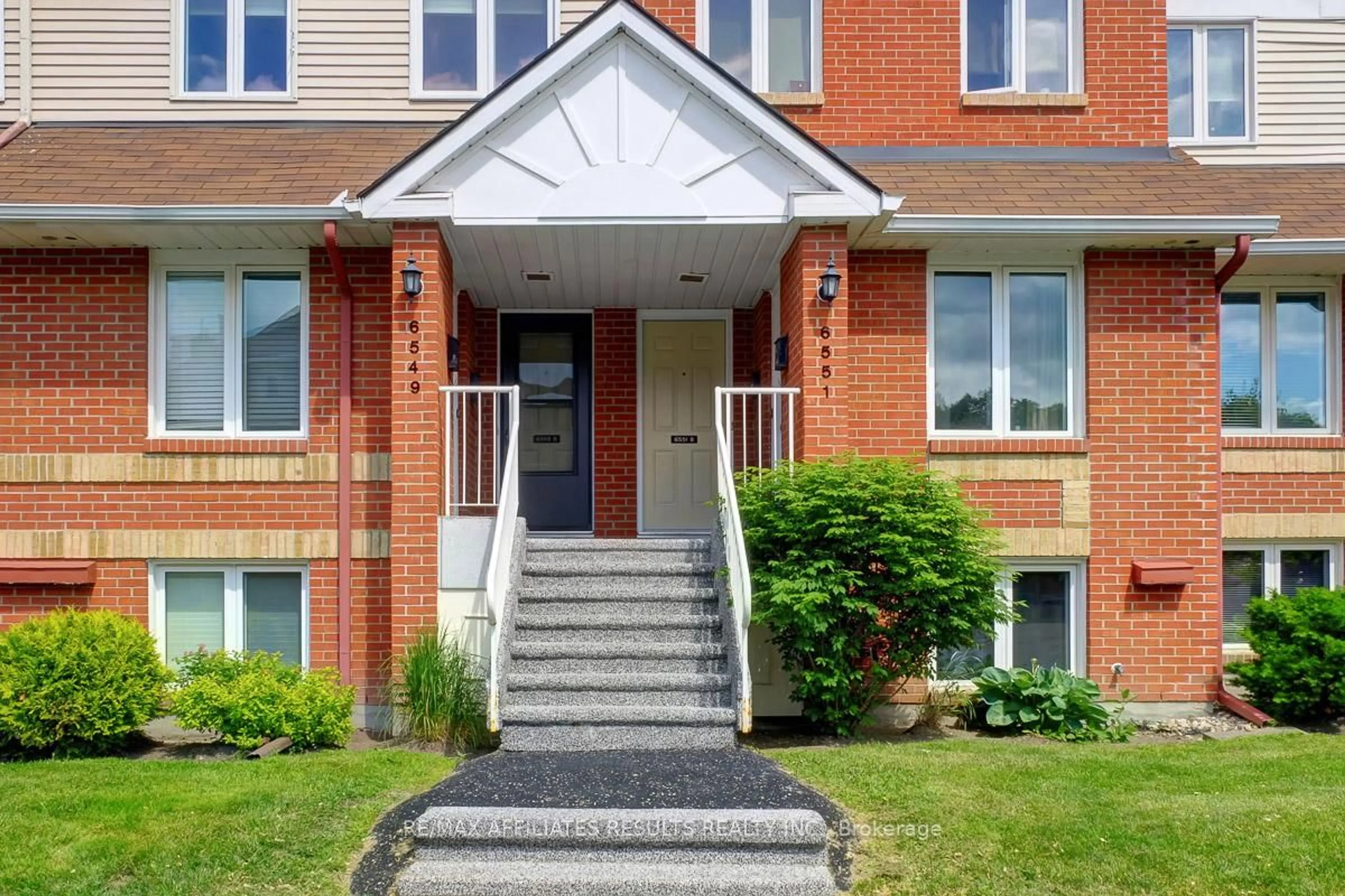 Home with brick exterior material, street for 6549 Bilberry Dr #6549B, Ottawa Ontario K1C 4N4
