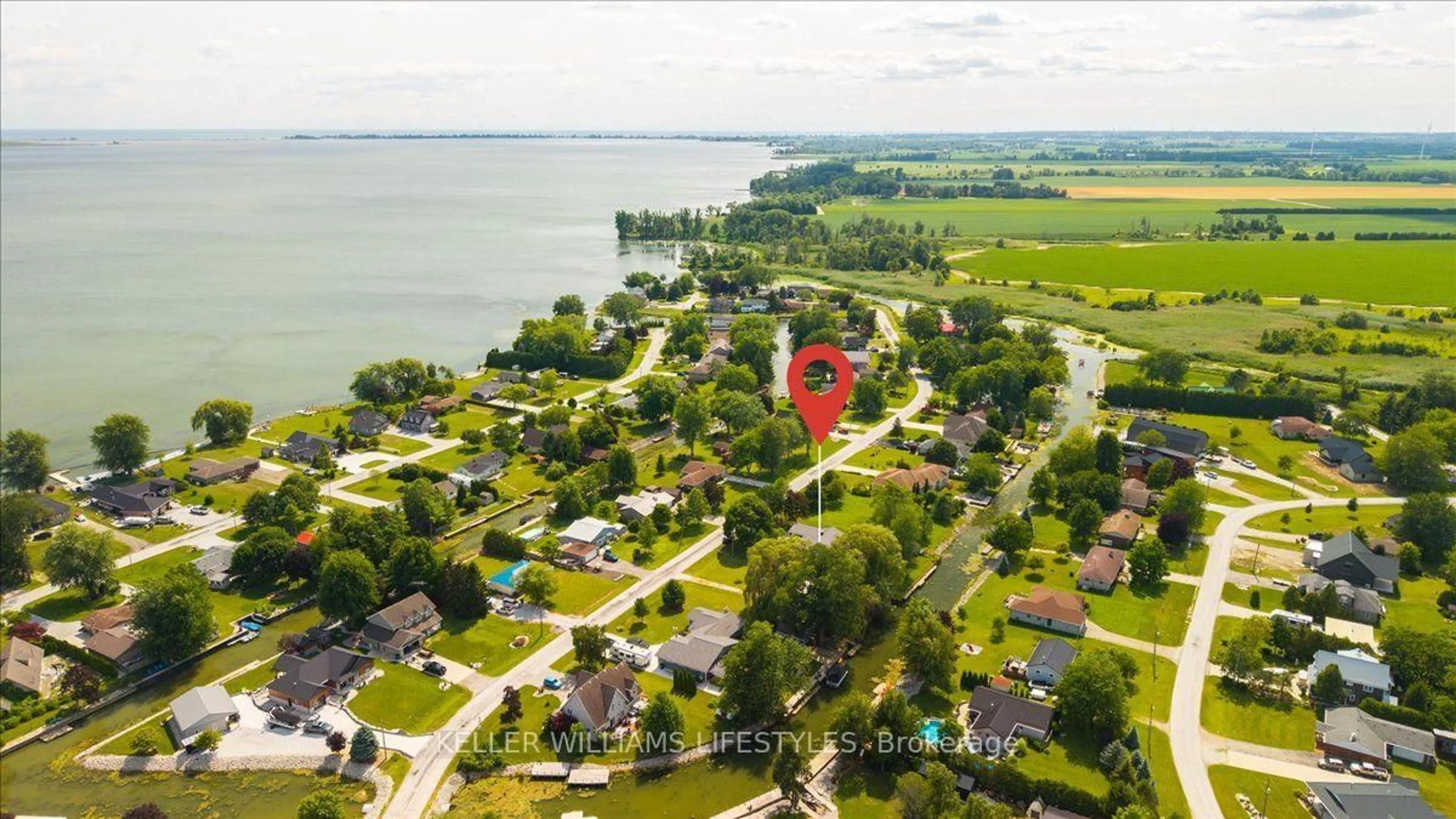 A pic from outside/outdoor area/front of a property/back of a property/a pic from drone, water/lake/river/ocean view for 11527 Lagonda Way, Chatham-Kent Ontario N0P 1X0
