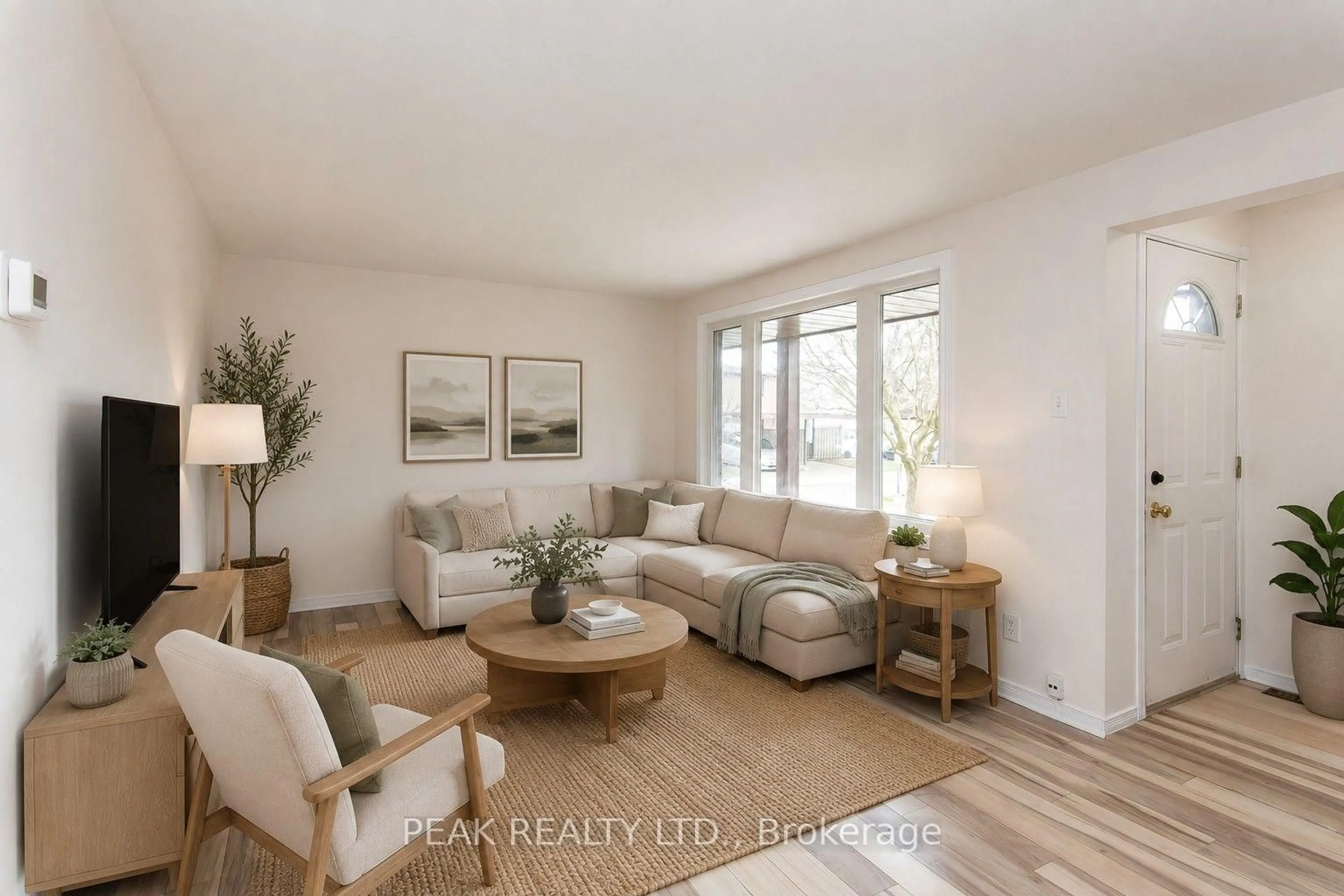 Living room with furniture, wood/laminate floor for 279 Sandowne Dr #7, Waterloo Ontario N2K 2C1