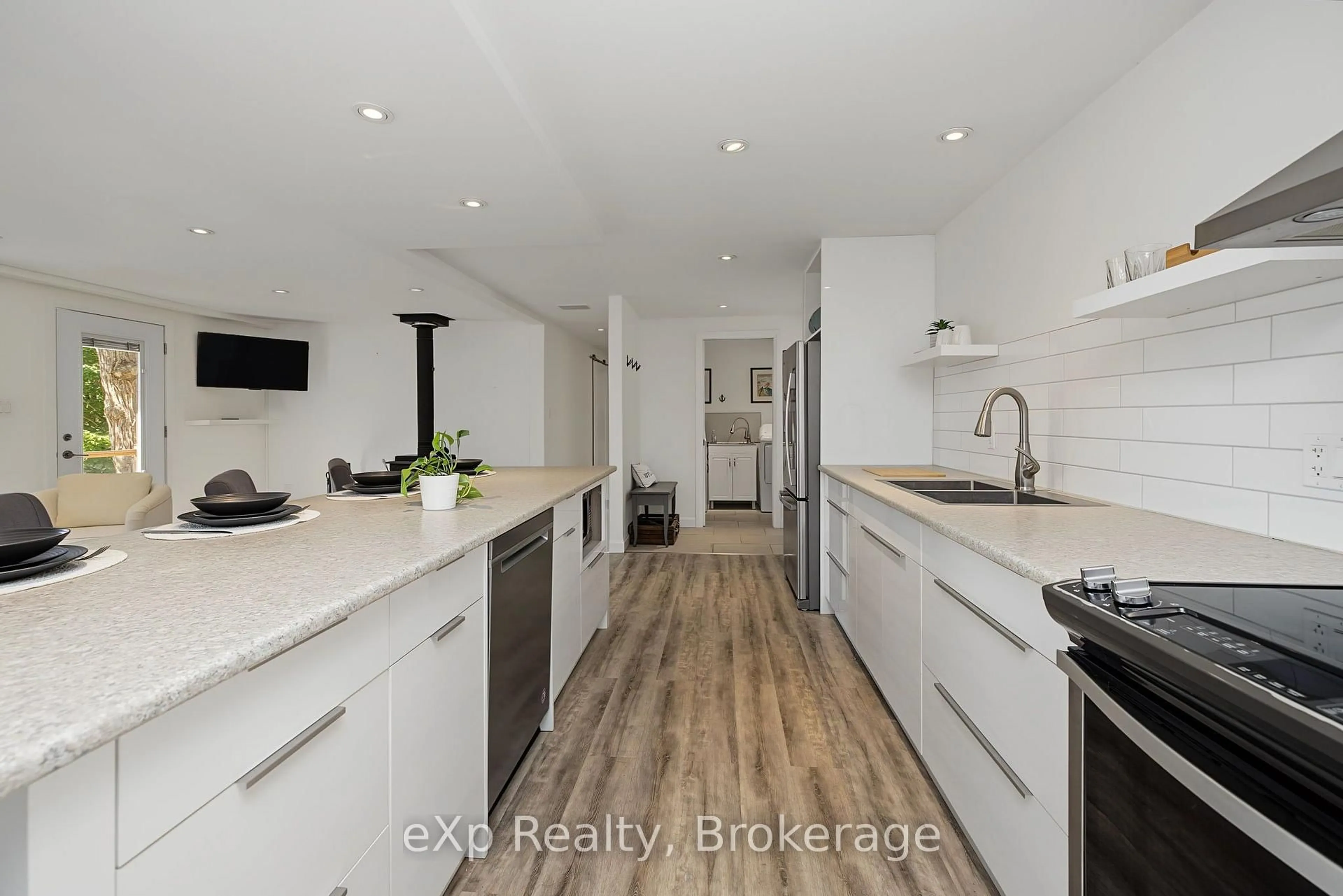 Open concept kitchen, wood/laminate floor for 3 Bayview Dr, Carling Ontario P0G 1G0