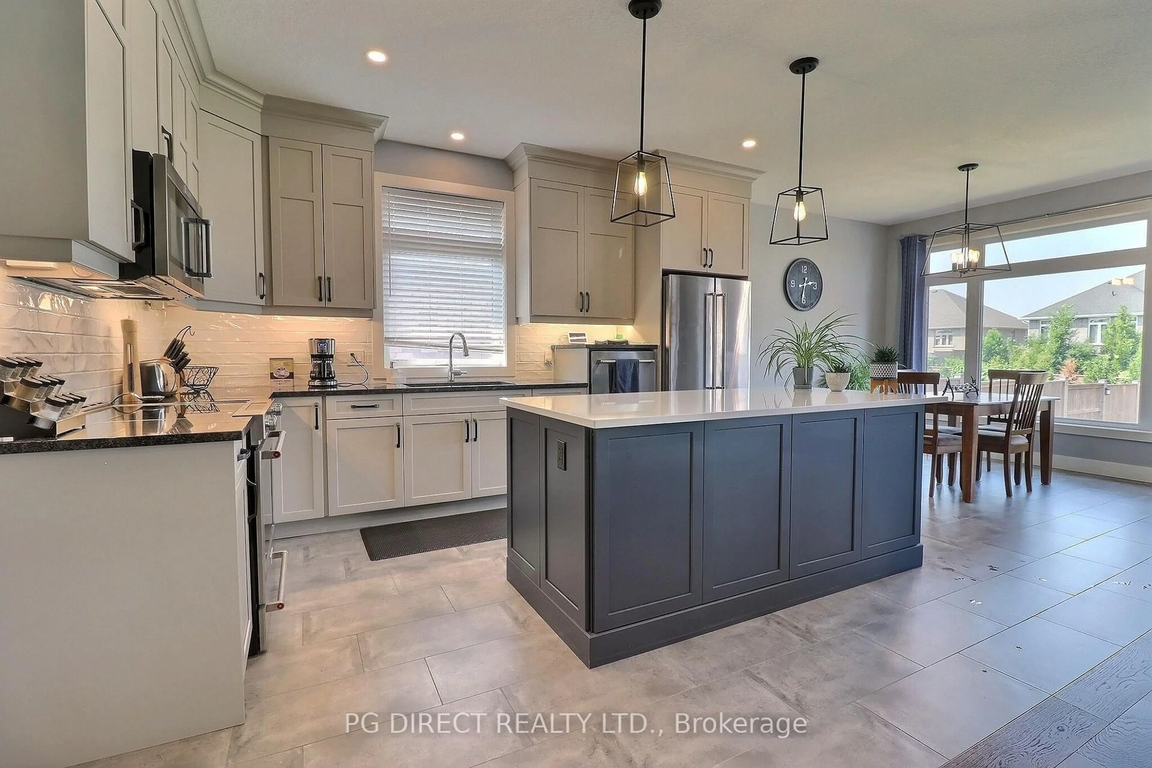 Open concept kitchen, ceramic/tile floor for 244 Jennifers Tr, Thames Centre Ontario N0M 2P0