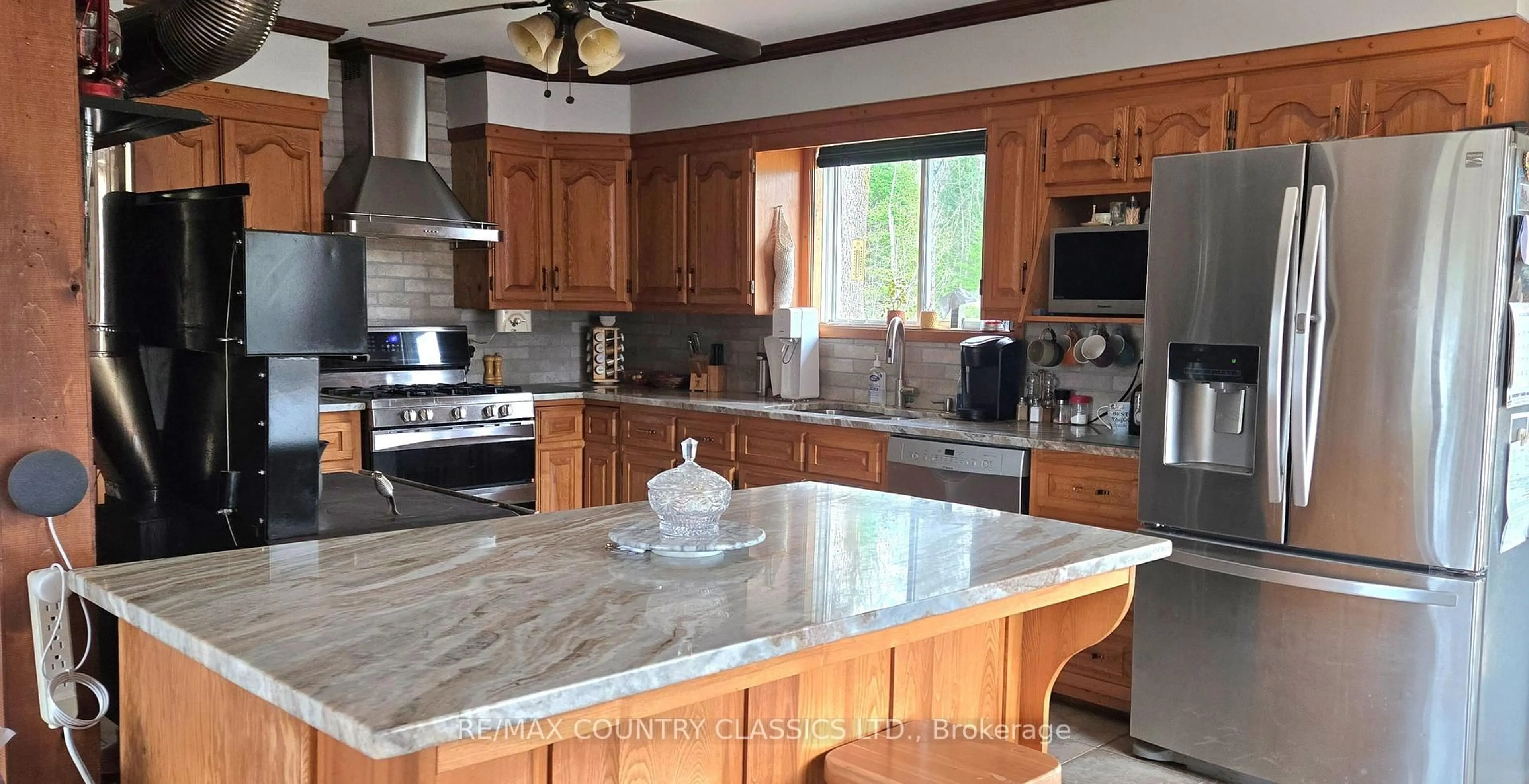 Open concept kitchen, ceramic/tile floor for 2445 Old Hastings Rd, Coe Hill Ontario K0L 1P0