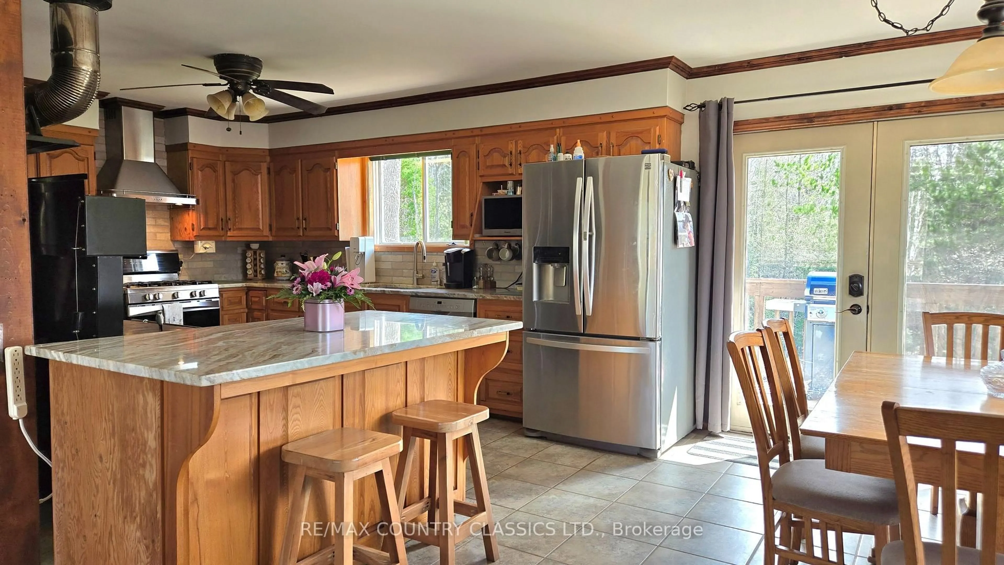 Open concept kitchen, ceramic/tile floor for 2445 Old Hastings Rd, Coe Hill Ontario K0L 1P0