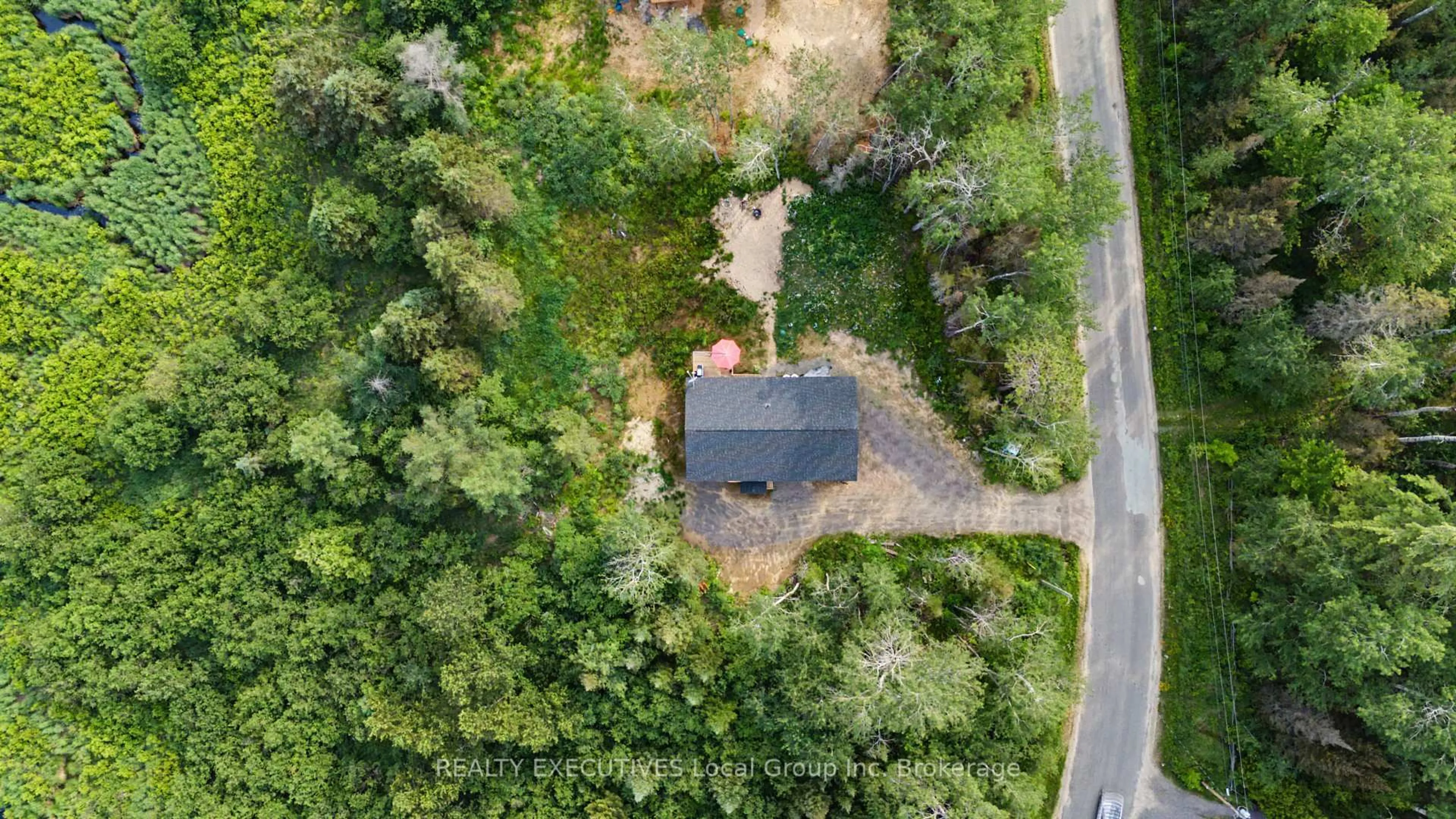 A pic from outside/outdoor area/front of a property/back of a property/a pic from drone, forest/trees view for 575 HART Rd, Callander Ontario P0H 1H0