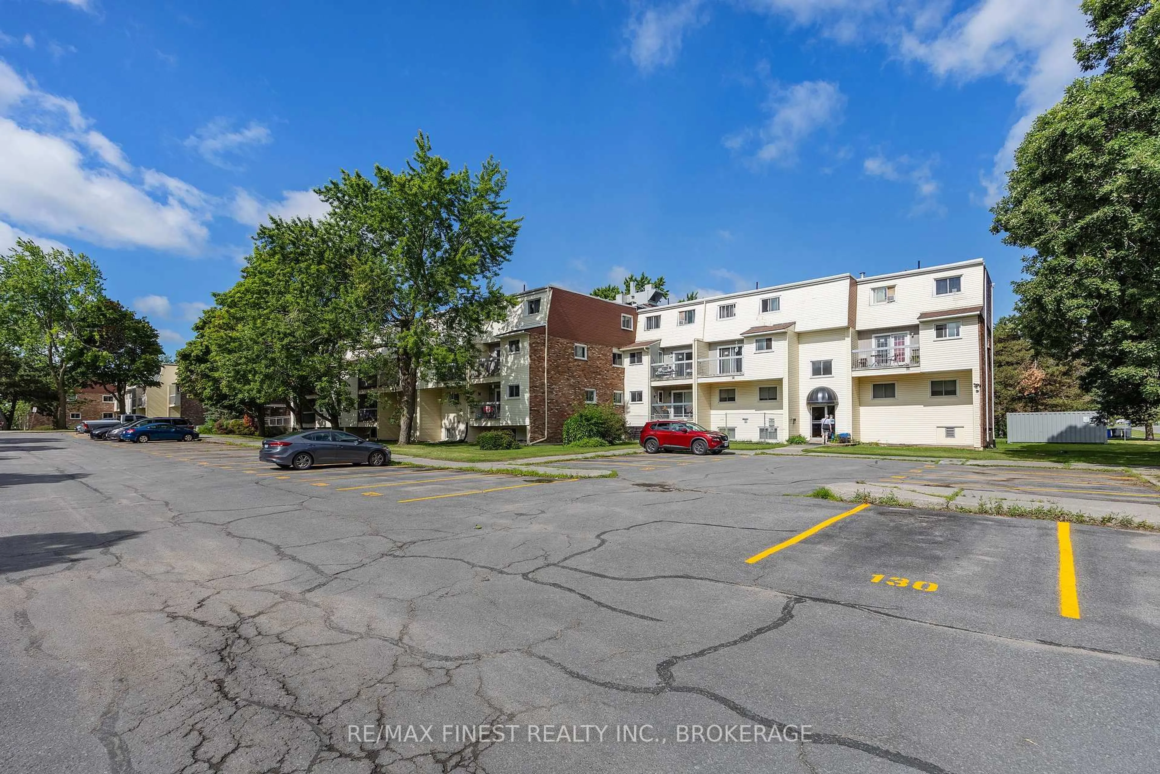 A pic from outside/outdoor area/front of a property/back of a property/a pic from drone, street for 845 Milford Dr #301, Kingston Ontario K7P 1A7
