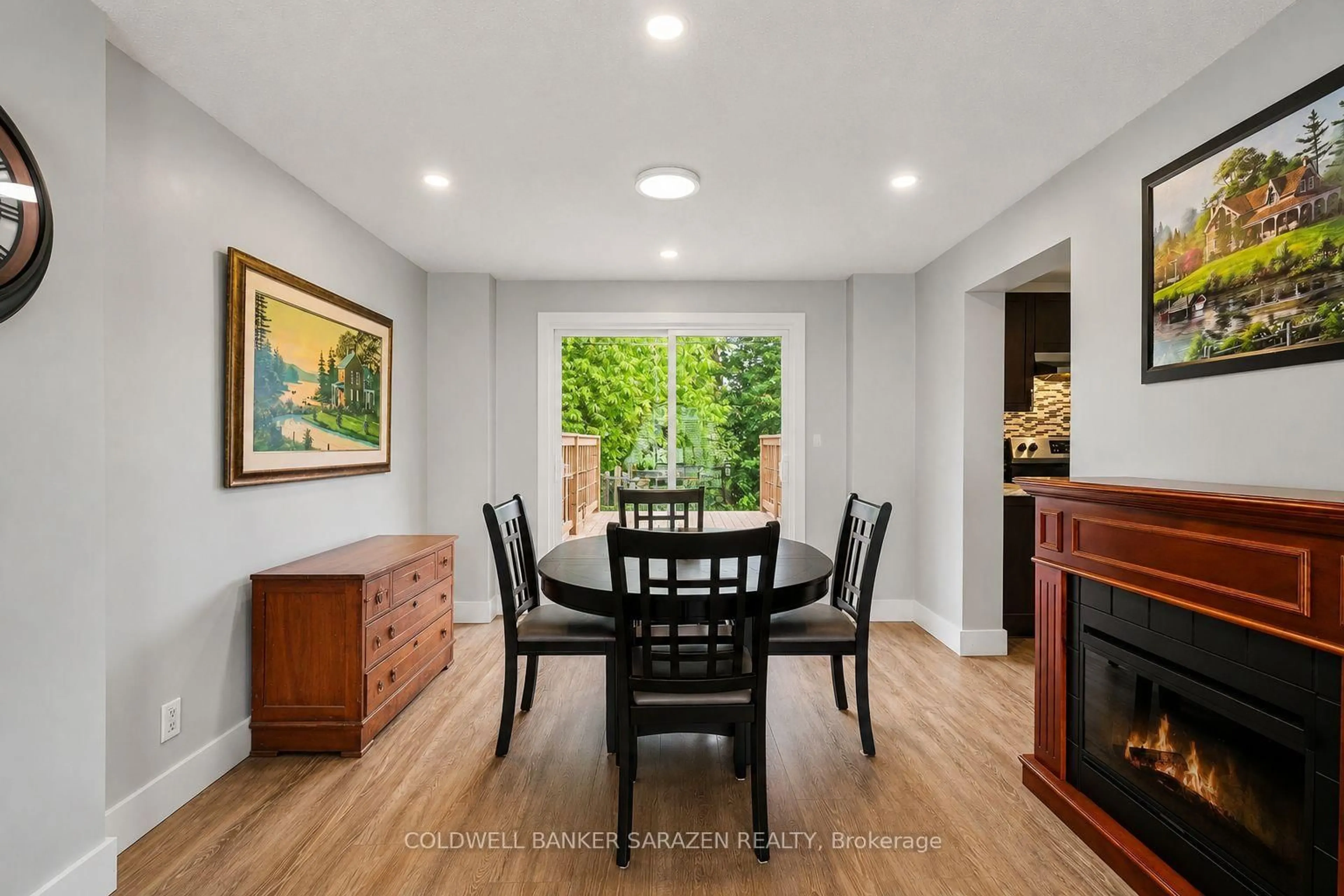 Dining room, wood/laminate floor for 34 Downsview Cres, Ottawa Ontario K2G 0A5