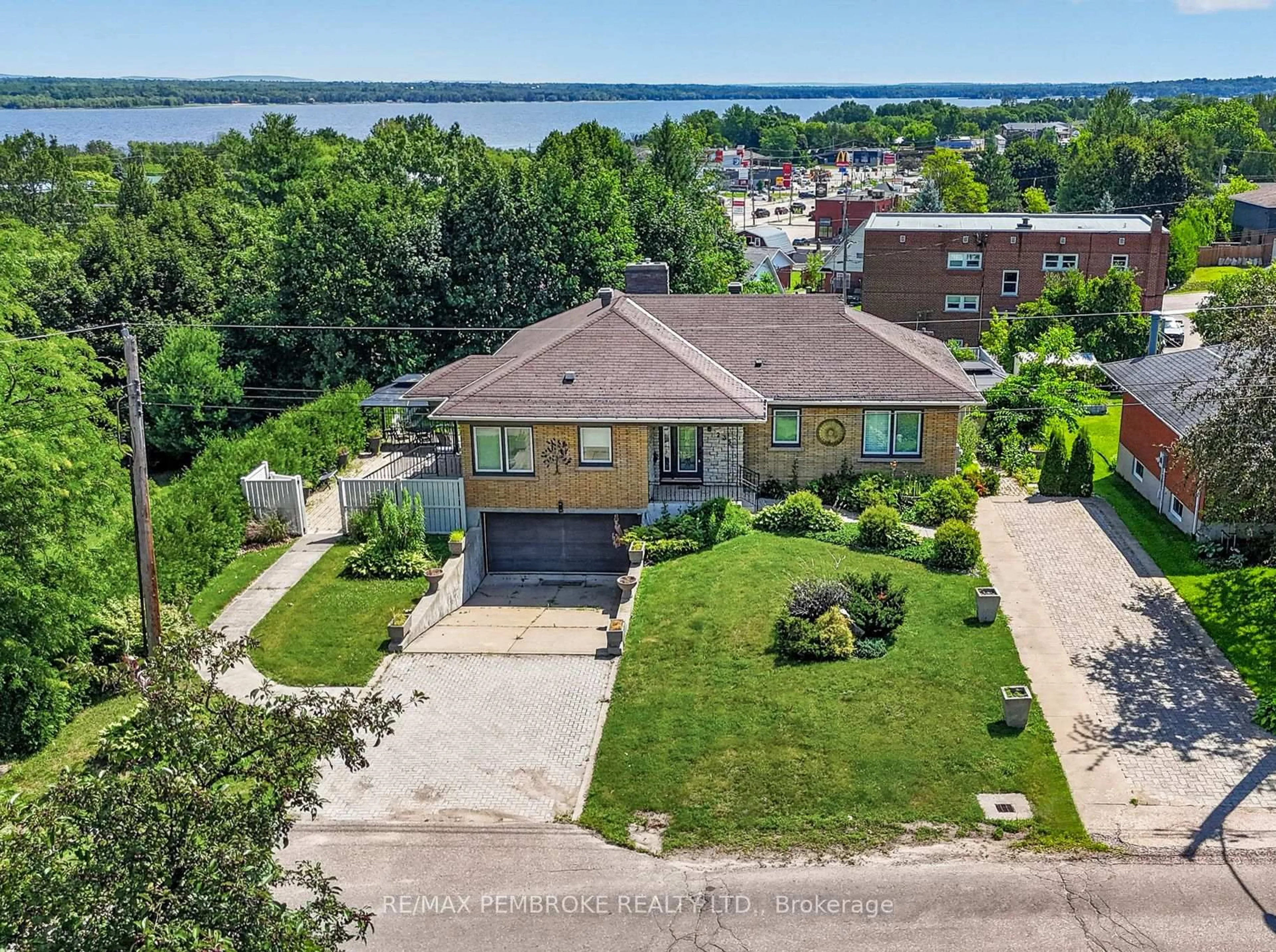 A pic from outside/outdoor area/front of a property/back of a property/a pic from drone, water/lake/river/ocean view for 235 Broadview Dr, Pembroke Ontario K8A 2A1
