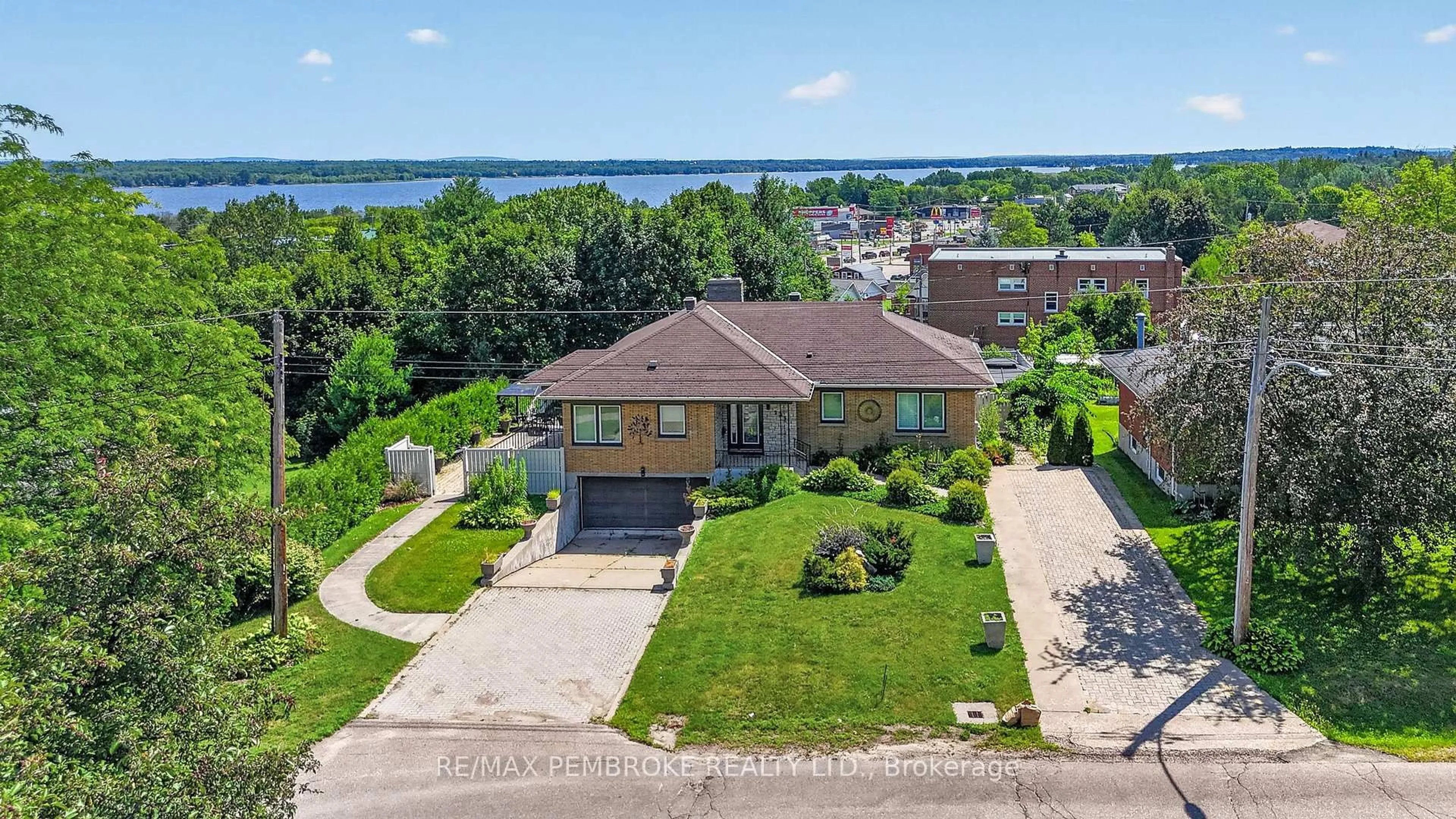 A pic from outside/outdoor area/front of a property/back of a property/a pic from drone, water/lake/river/ocean view for 235 Broadview Dr, Pembroke Ontario K8A 2A1