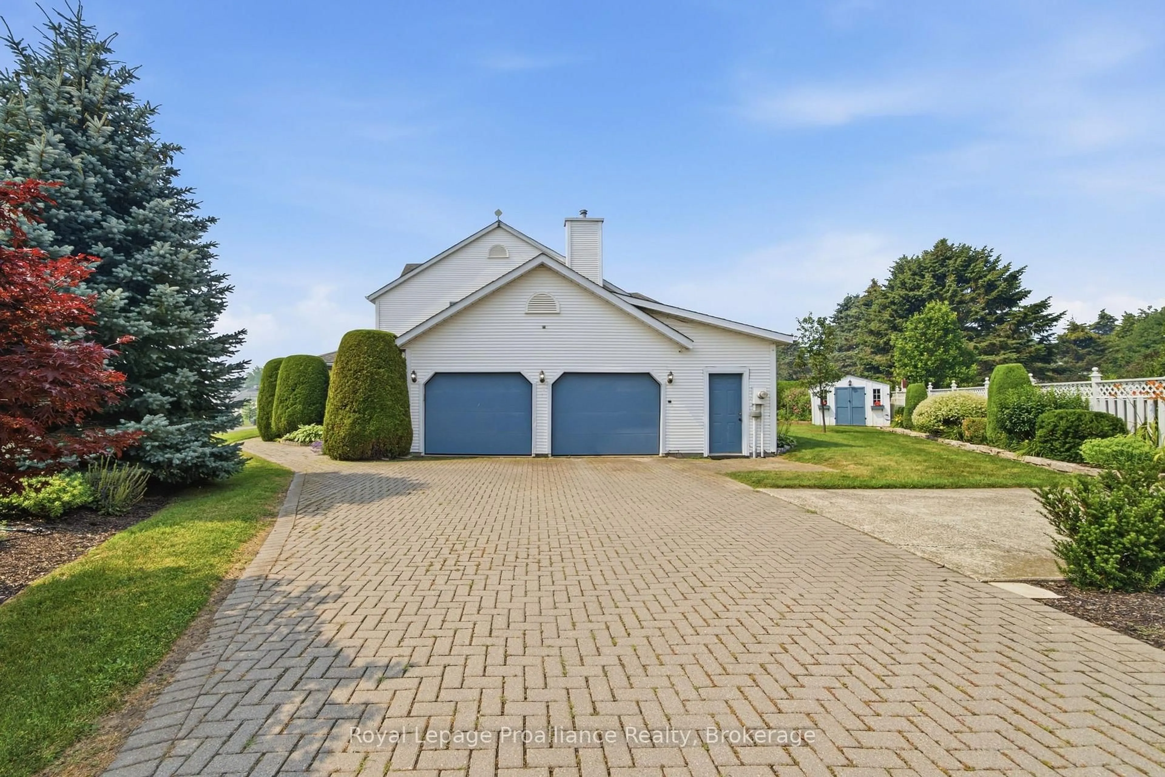 A pic from outside/outdoor area/front of a property/back of a property/a pic from drone, street for 10 Skiff Cove Rd, Prince Edward County Ontario K0K 3L0