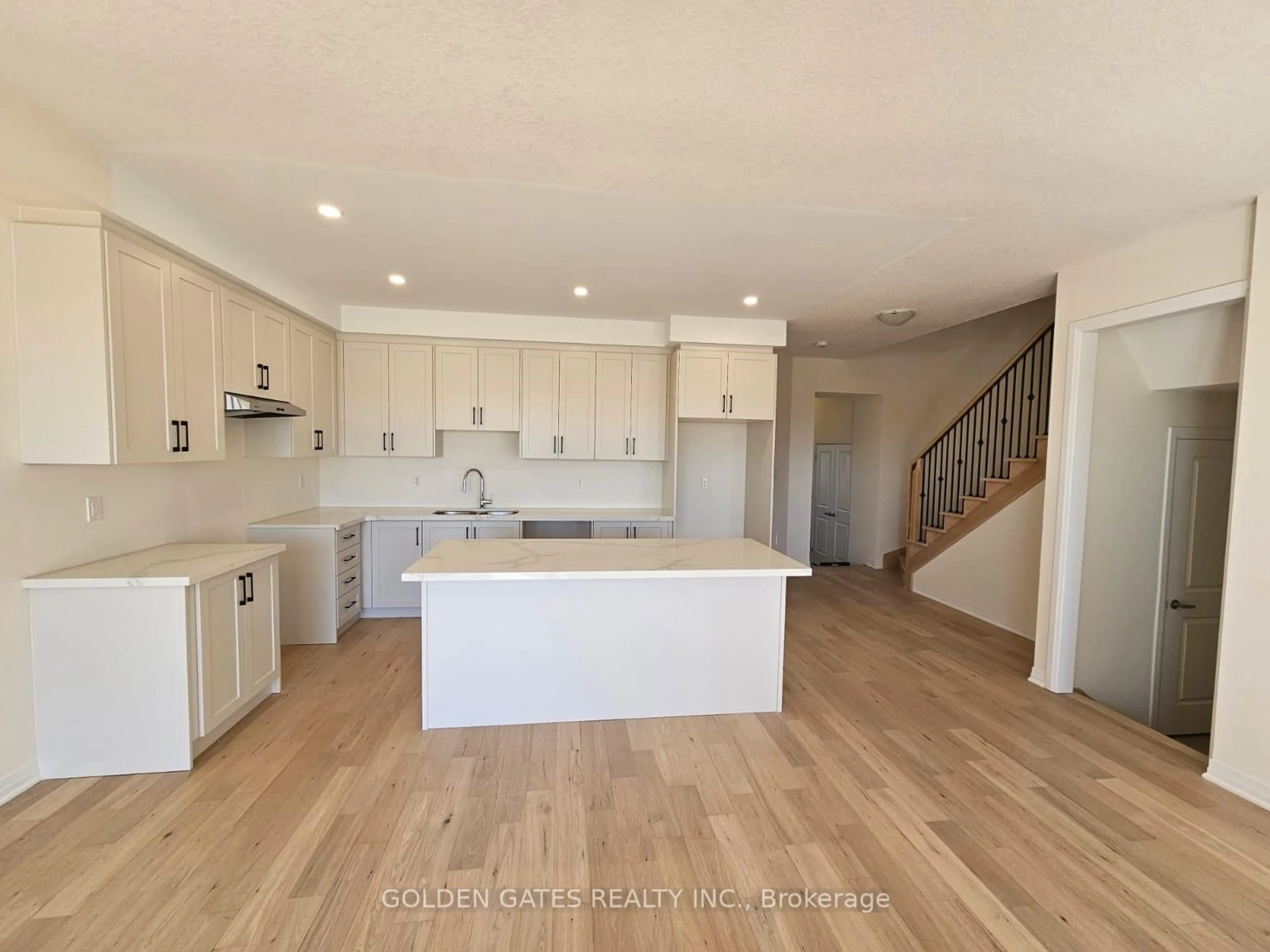Open concept kitchen, wood/laminate floor for 23 Jacko St, Tillsonburg Ontario N4G 0L8