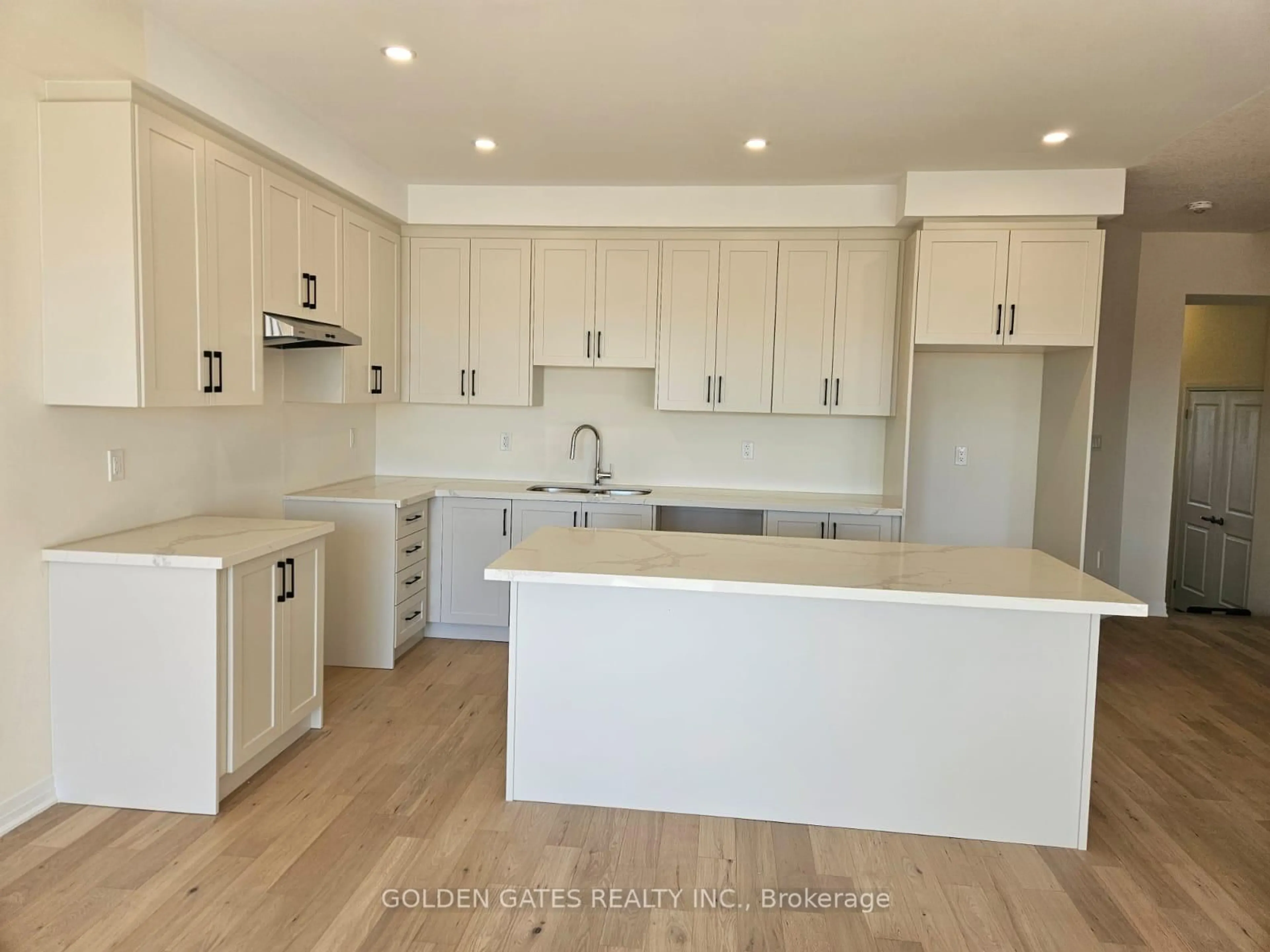 Open concept kitchen, wood/laminate floor for 23 Jacko St, Tillsonburg Ontario N4G 0L8