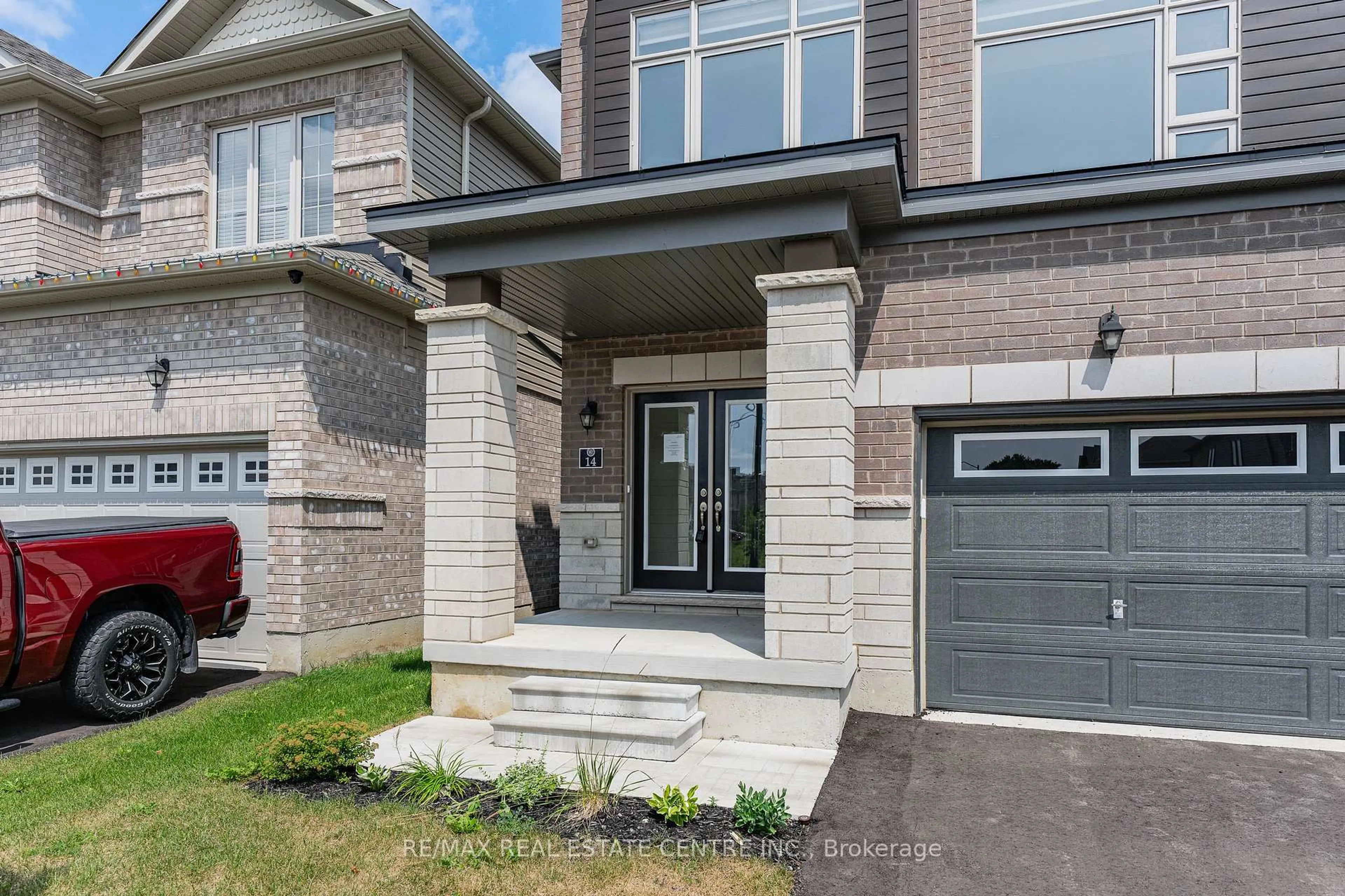 Home with brick exterior material, street for 14 Heming St, Brant Ontario N3L 0M5
