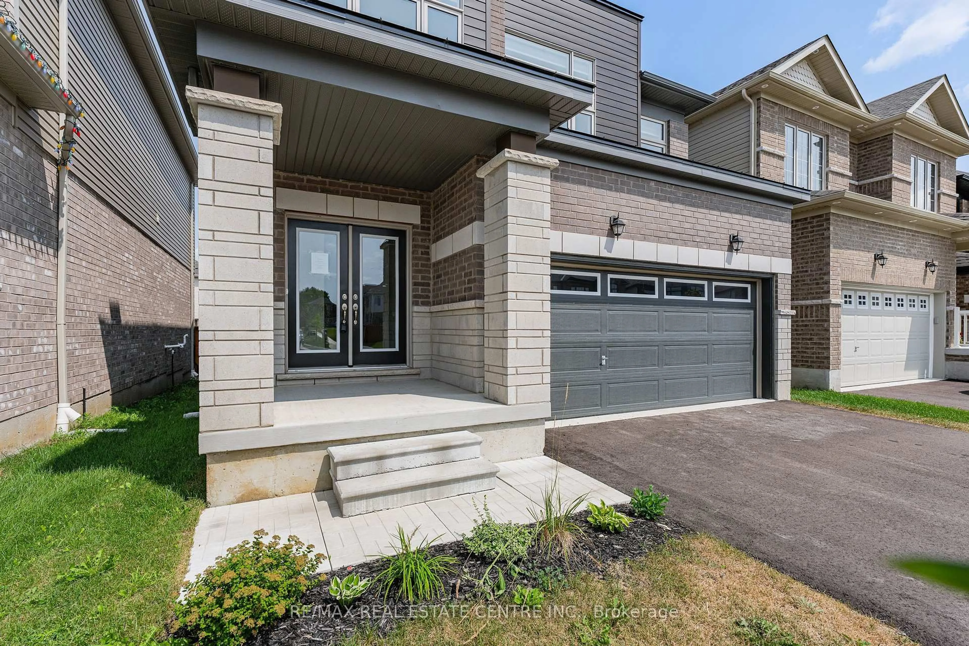 Home with brick exterior material, street for 14 Heming St, Brant Ontario N3L 0M5