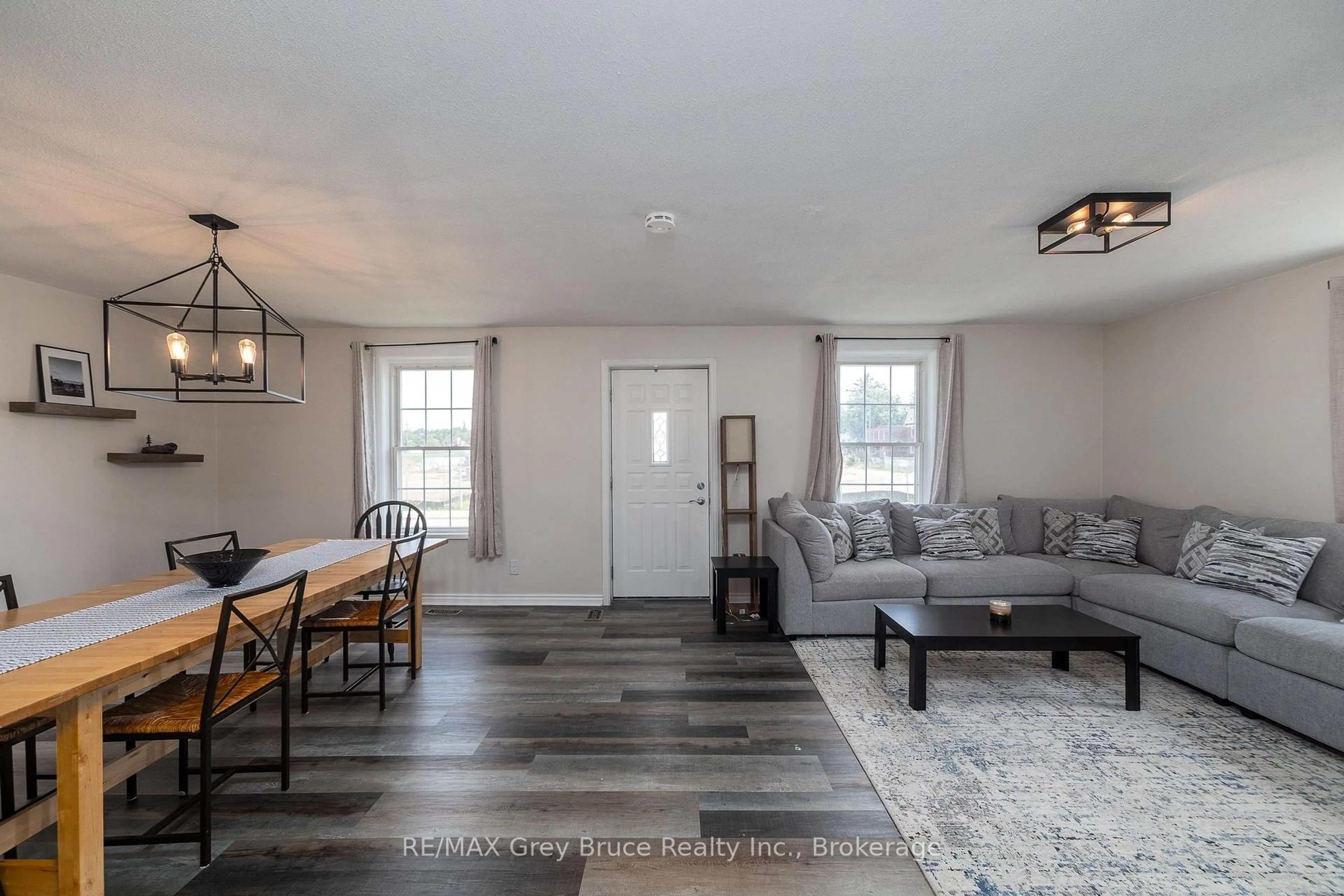 Living room with furniture, wood/laminate floor for 1110 2nd Ave, Owen Sound Ontario N4K 4N2
