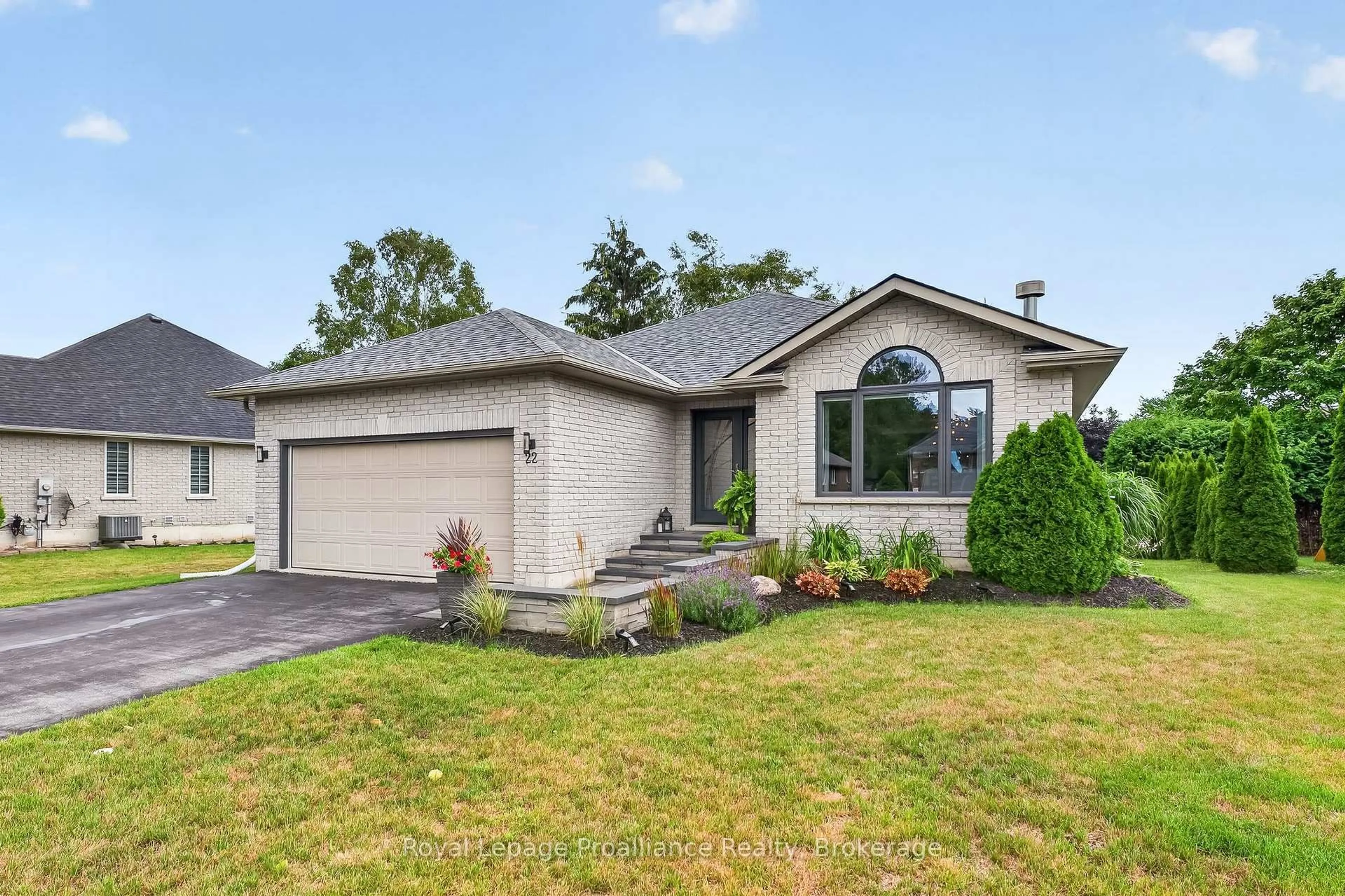 Home with vinyl exterior material, street for 22 Iroquois Ave, Brighton Ontario K0K 1H0