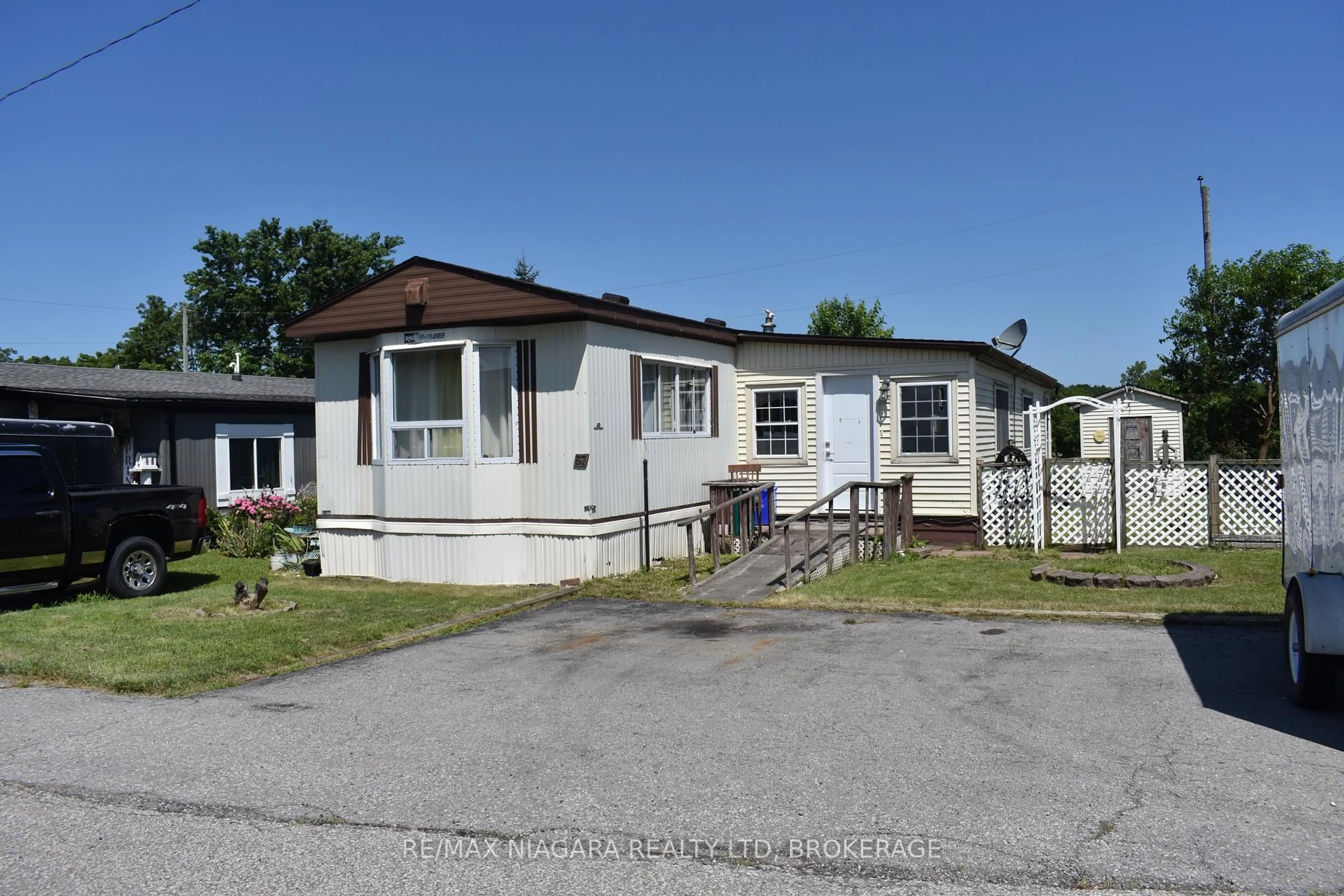 Home with vinyl exterior material, street for 2175 Mewburn Rd #67, Niagara Falls Ontario L2J 0A6