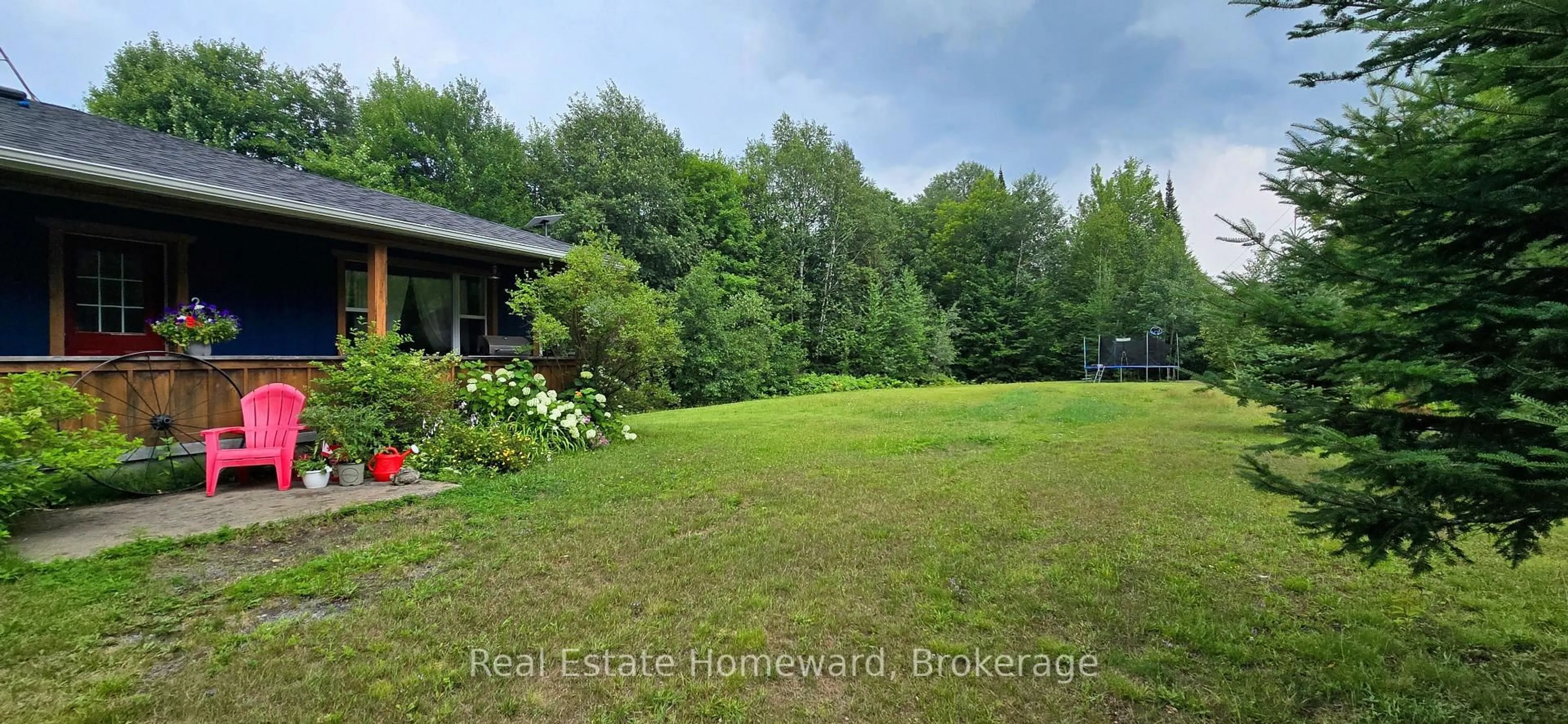 A pic from outside/outdoor area/front of a property/back of a property/a pic from drone, water/lake/river/ocean view for 2896 Brunel Rd, Huntsville Ontario P1H 2J3