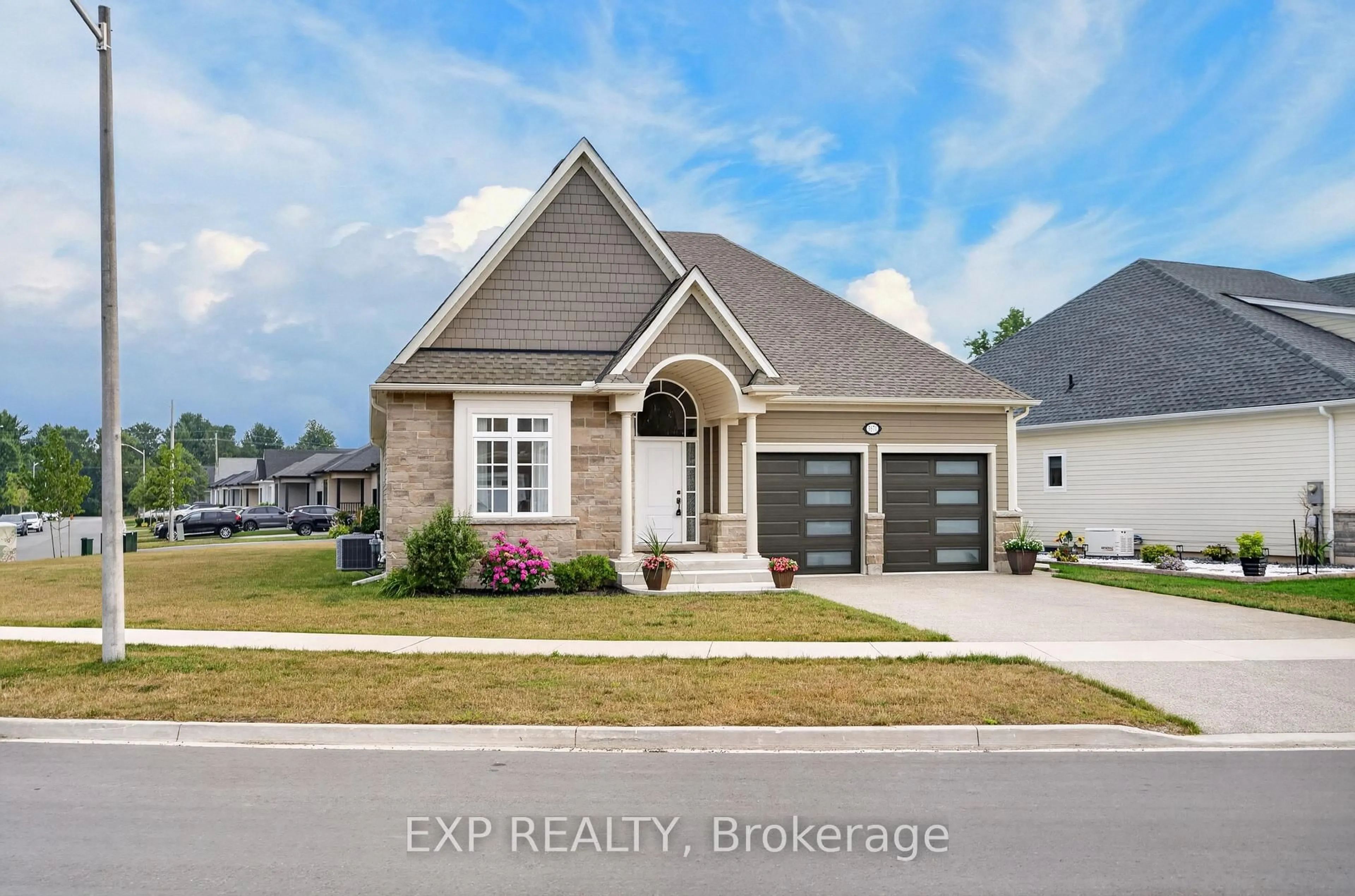 Home with brick exterior material, street for 3571 Whispering Woods Tr, Fort Erie Ontario L0S 1N0