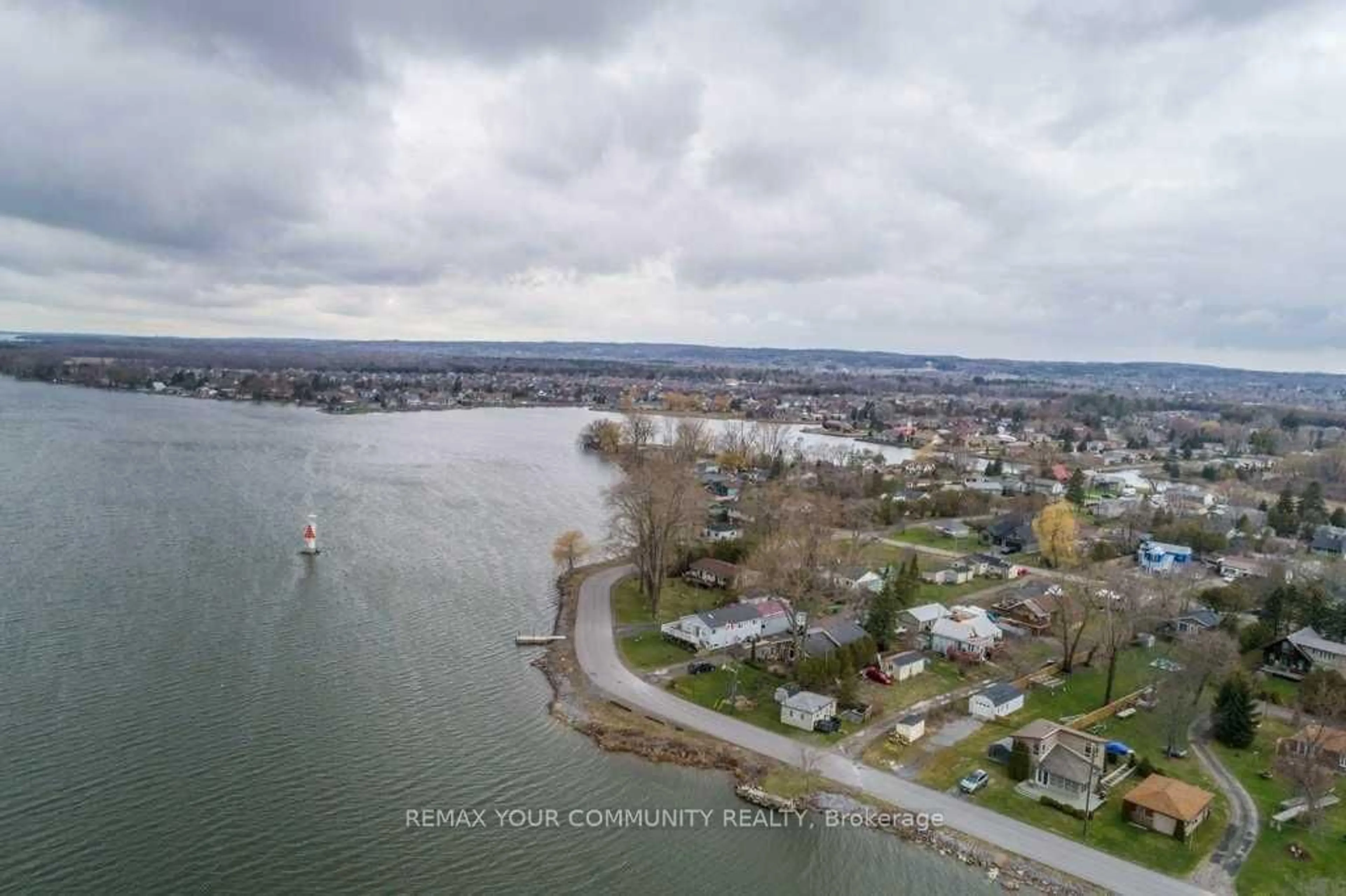 A pic from outside/outdoor area/front of a property/back of a property/a pic from drone, water/lake/river/ocean view for 17 Price St, Brighton Ontario K0K 1H0