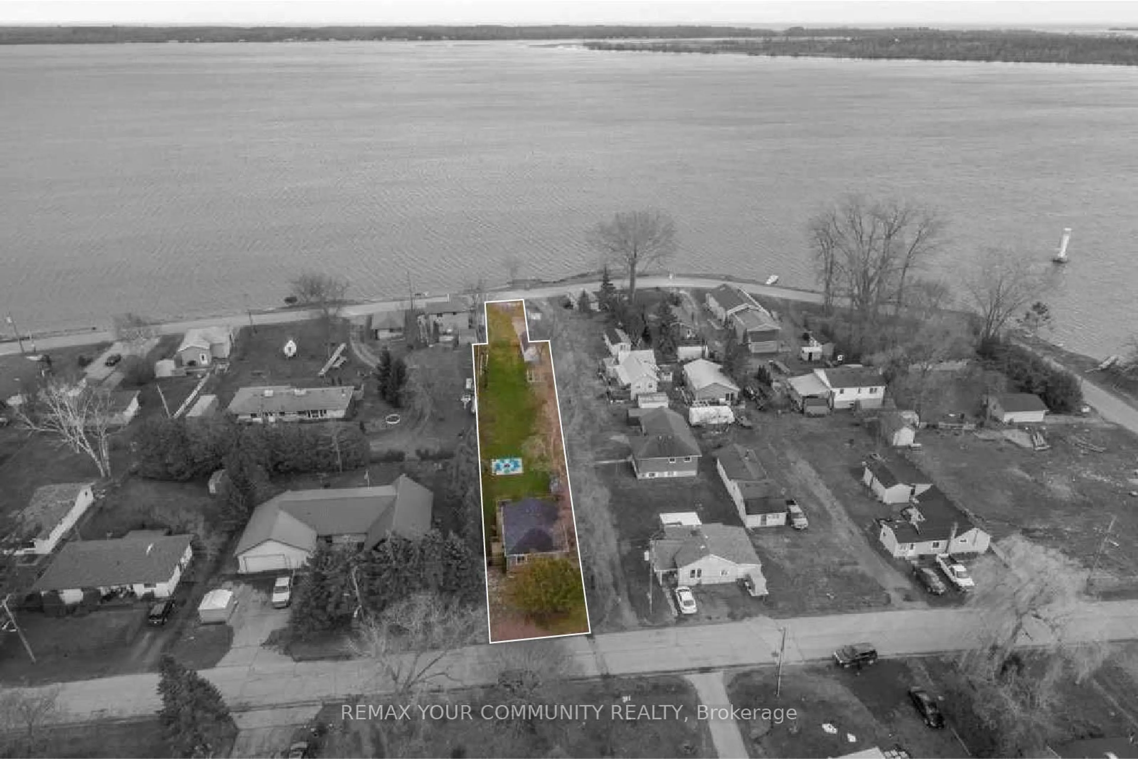 A pic from outside/outdoor area/front of a property/back of a property/a pic from drone, water/lake/river/ocean view for 17 Price St, Brighton Ontario K0K 1H0
