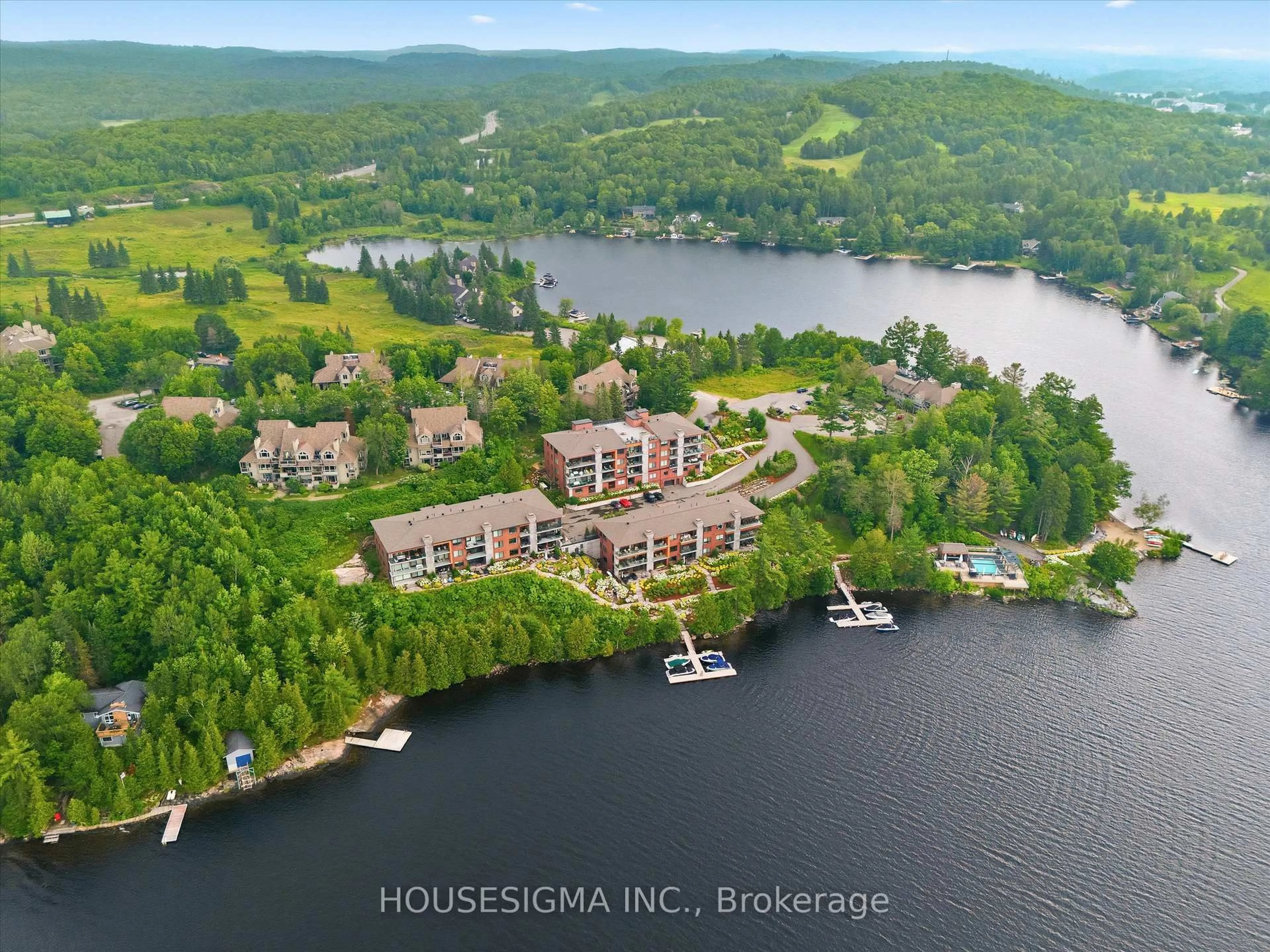 A pic from outside/outdoor area/front of a property/back of a property/a pic from drone, water/lake/river/ocean view for 631 Grandview Hilltop Dr #6, Huntsville Ontario P1H 2J5