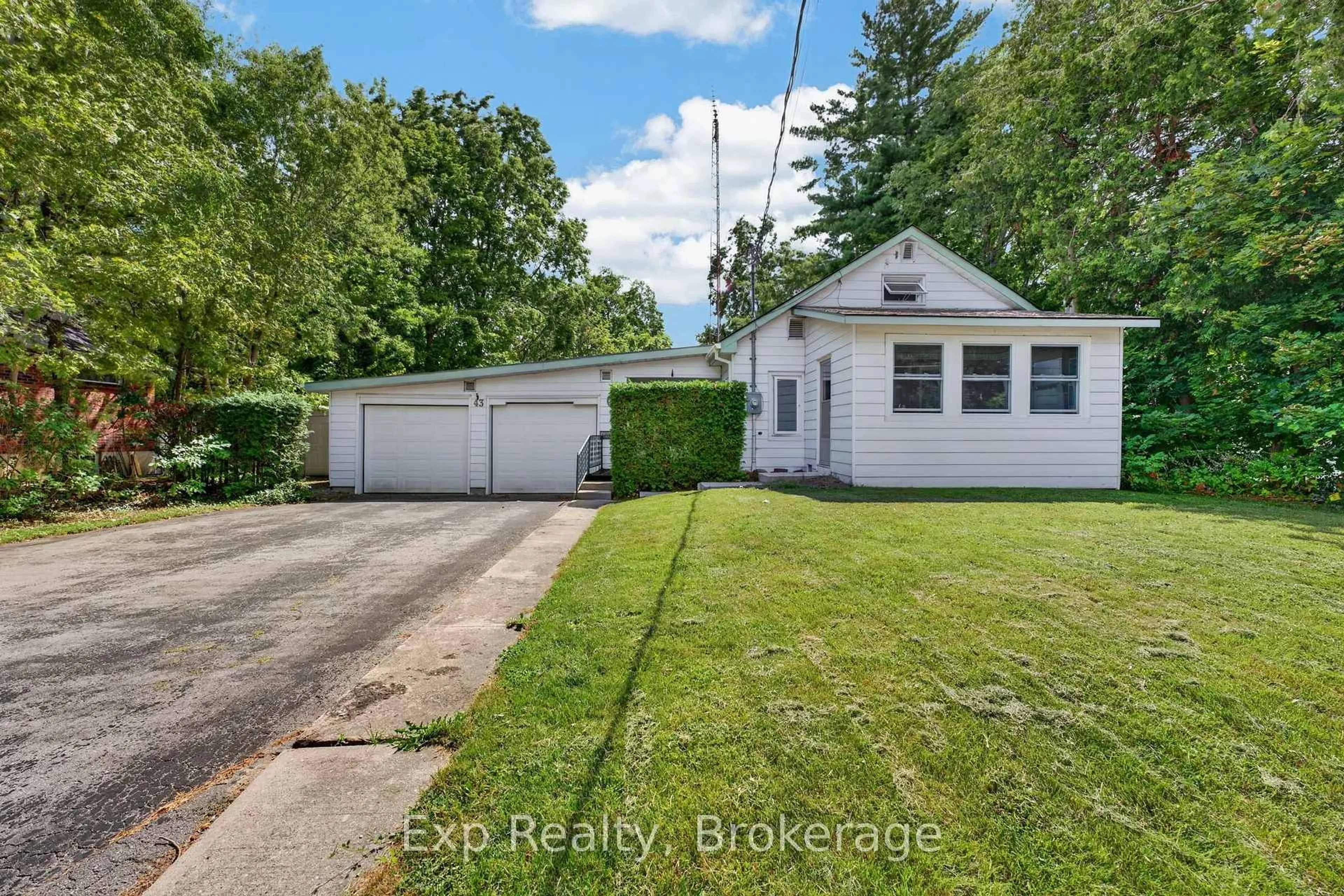 A pic from outside/outdoor area/front of a property/back of a property/a pic from drone, street for 43 Paul St, Prince Edward County Ontario K0K 2T0