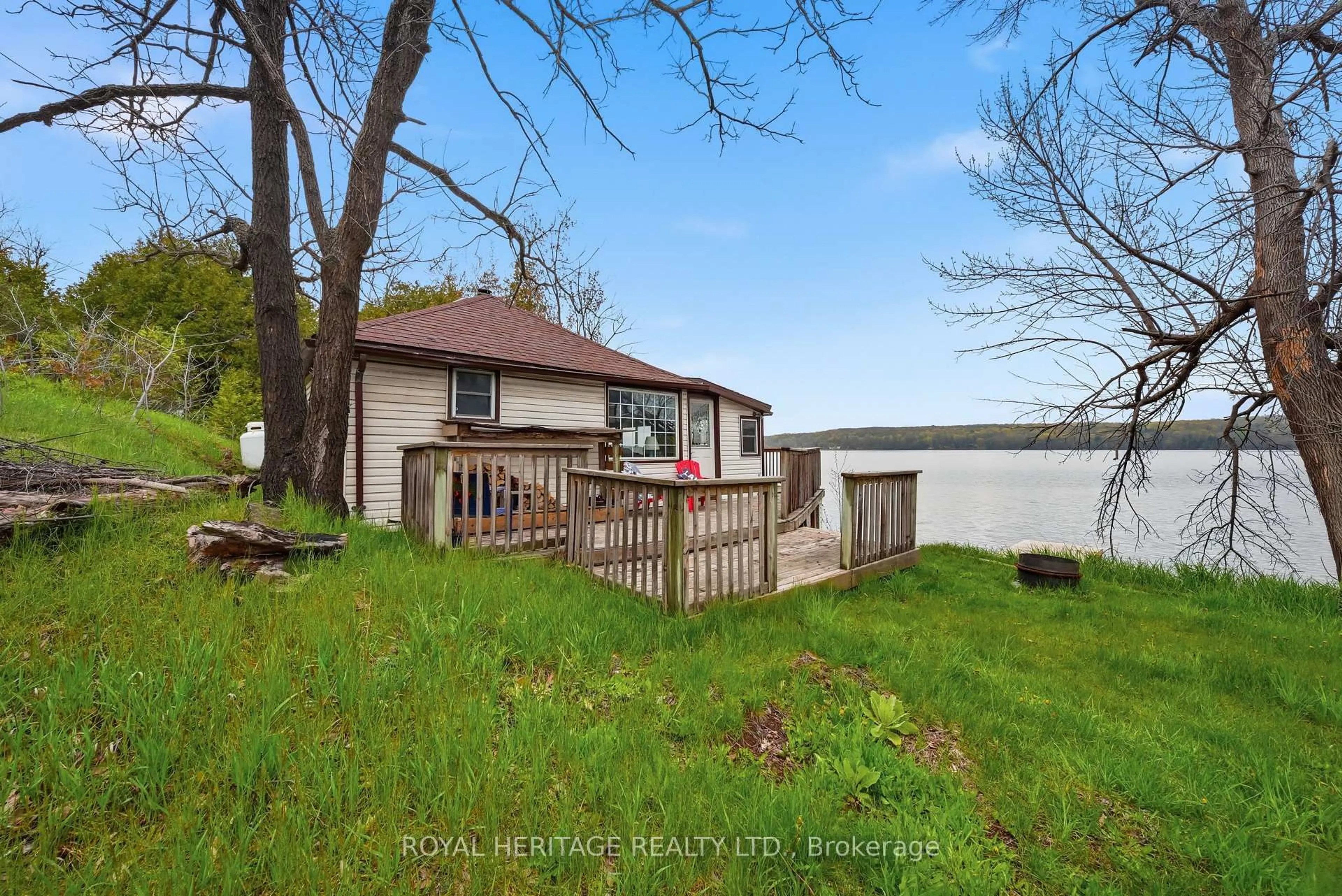 A pic from outside/outdoor area/front of a property/back of a property/a pic from drone, water/lake/river/ocean view for 13258 Highway 62 Way, Madoc Ontario K0K 2K0